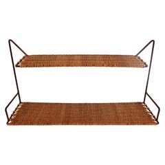 Étagère en osier et métal noir par Raoul Guys, France, 1950