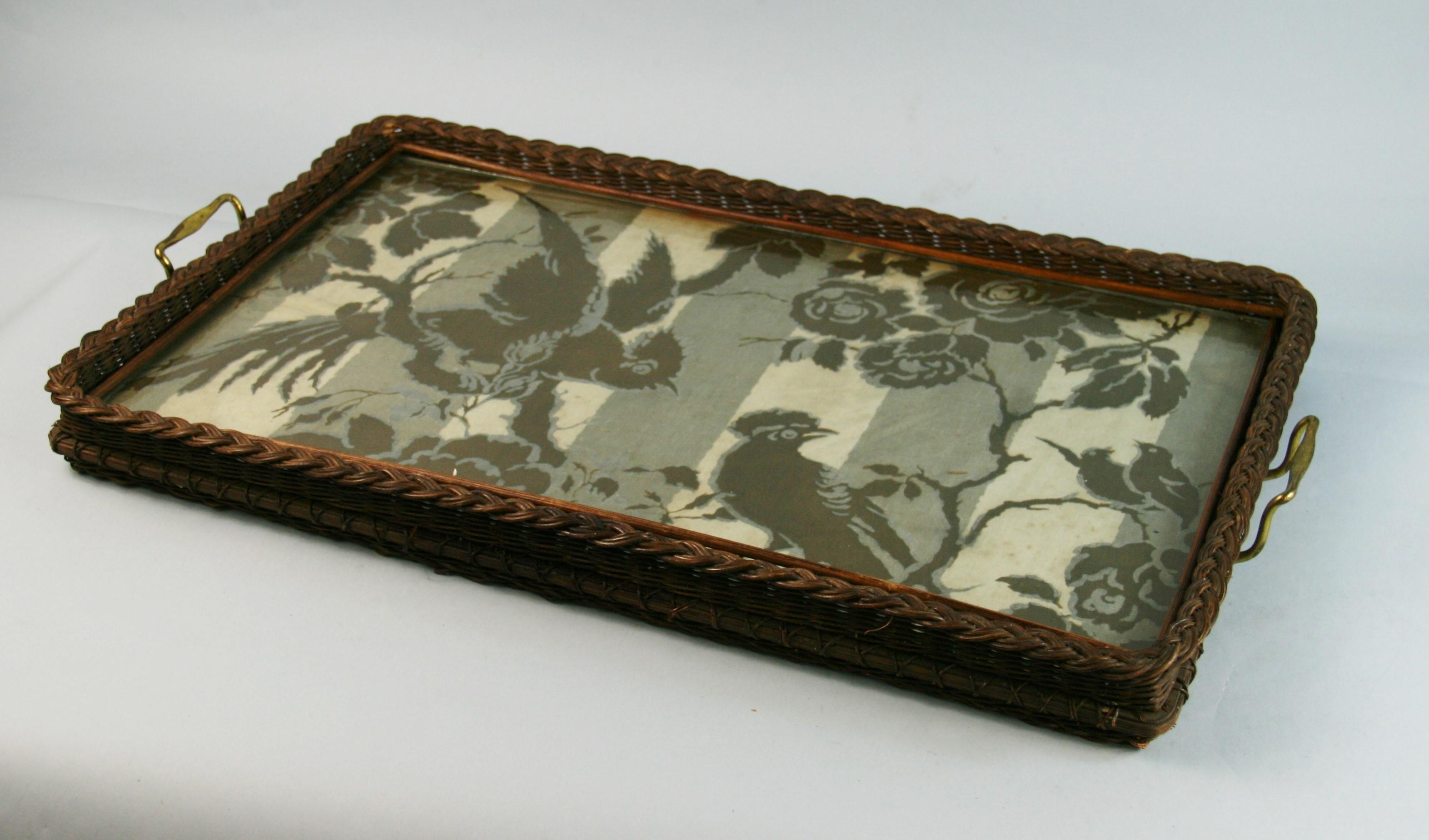3-654 Wicker and brass serving tray with fabric under glass surface.