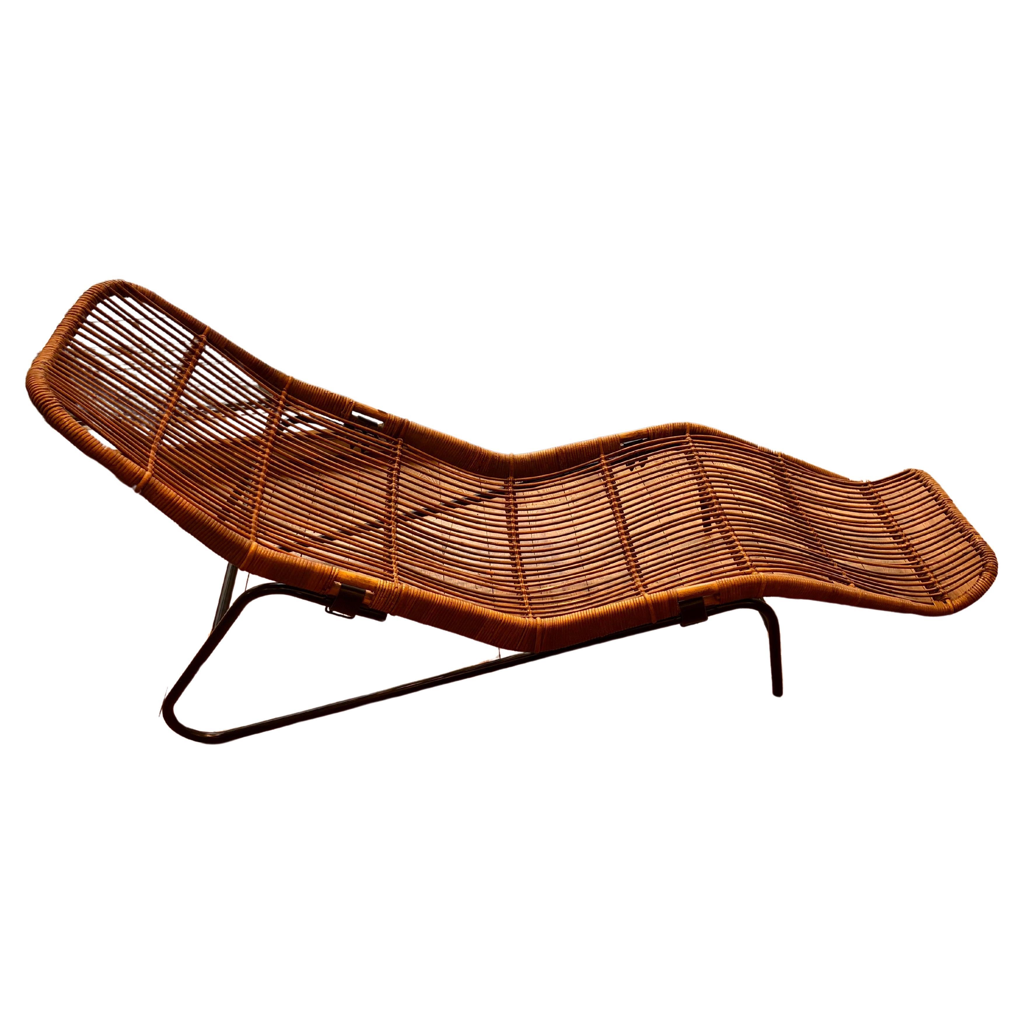 wicker lounge chair designed by the talented designer Dirk Van Sliedrecht:
This remarkable wicker lounge chair transcends mere functionality—it embodies a harmonious blend of craftsmanship, aesthetics, and rarity. Crafted meticulously it stands as a