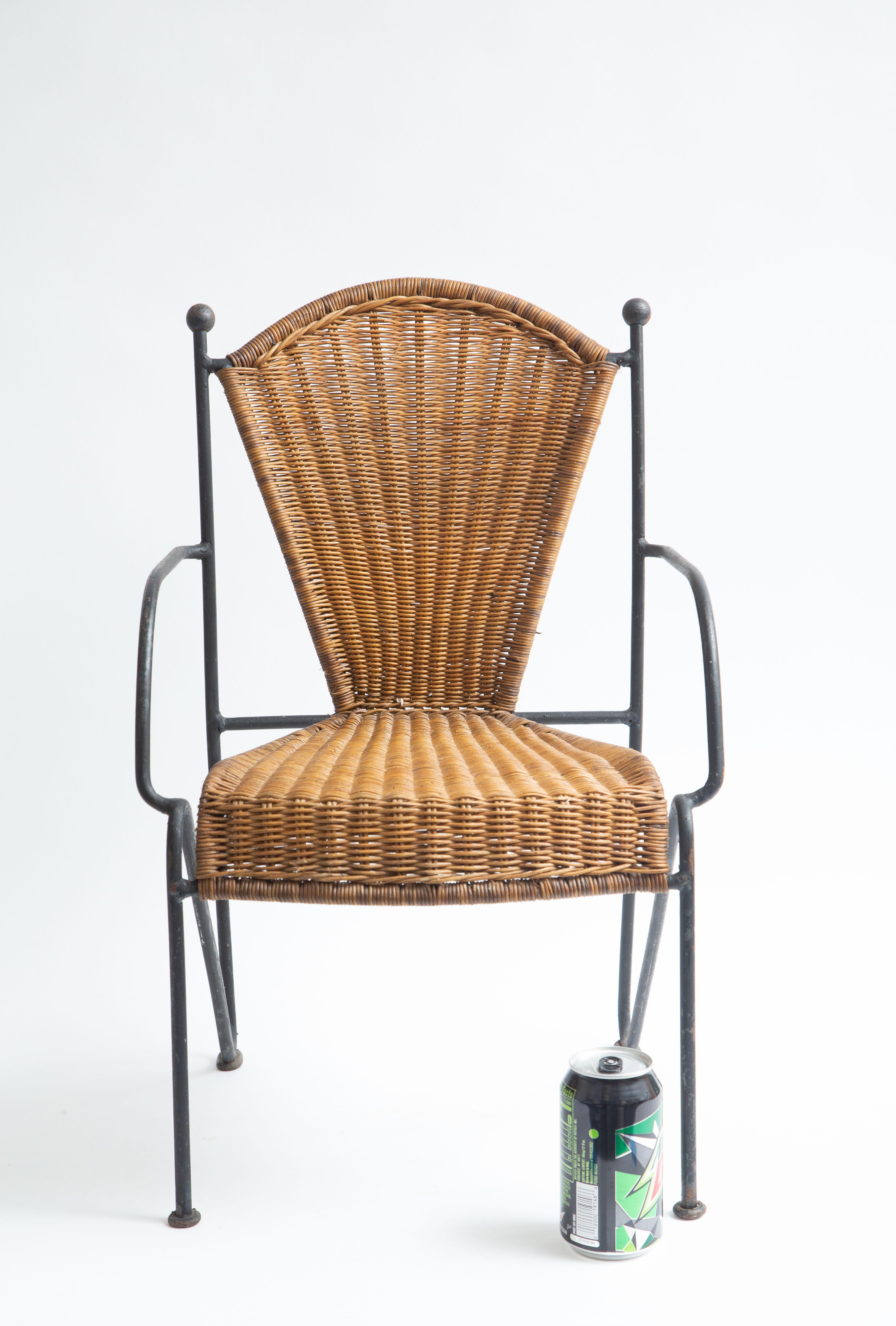 North American Wicker and Painted Iron Childs Chair For Sale