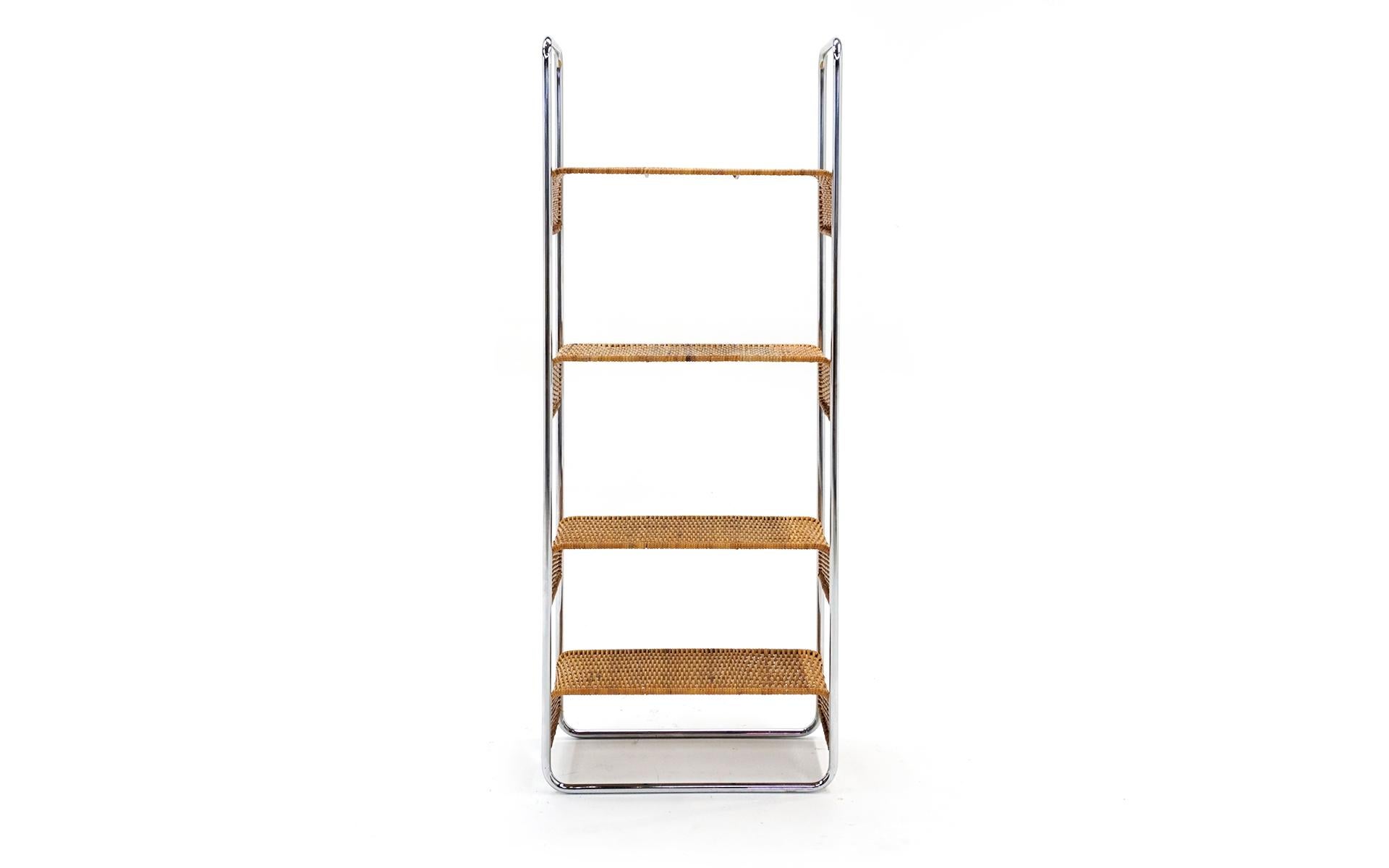 The wicker shelves are removable from the tubular chrome making this easy to transport. This would make a great storage piece in any number of places in a home. No breaks in the wicker. Some minor signs of wear to the tubular chrome. Ready to use.
