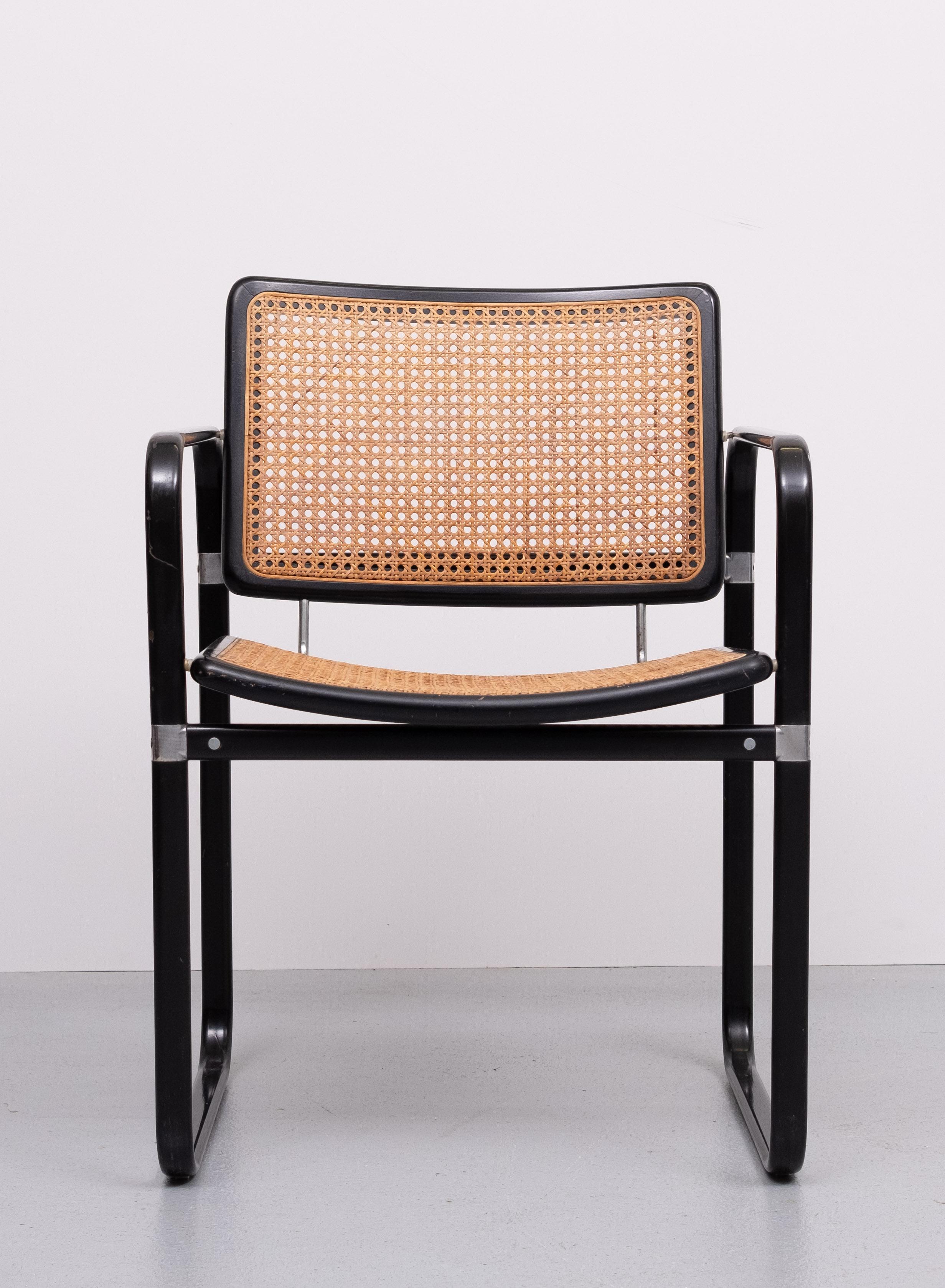 Very nice armchair . In the style of Marcel Breuer . Wicker seat 
and back rest .Good seating comfort . And a good looking chair .
1970s 