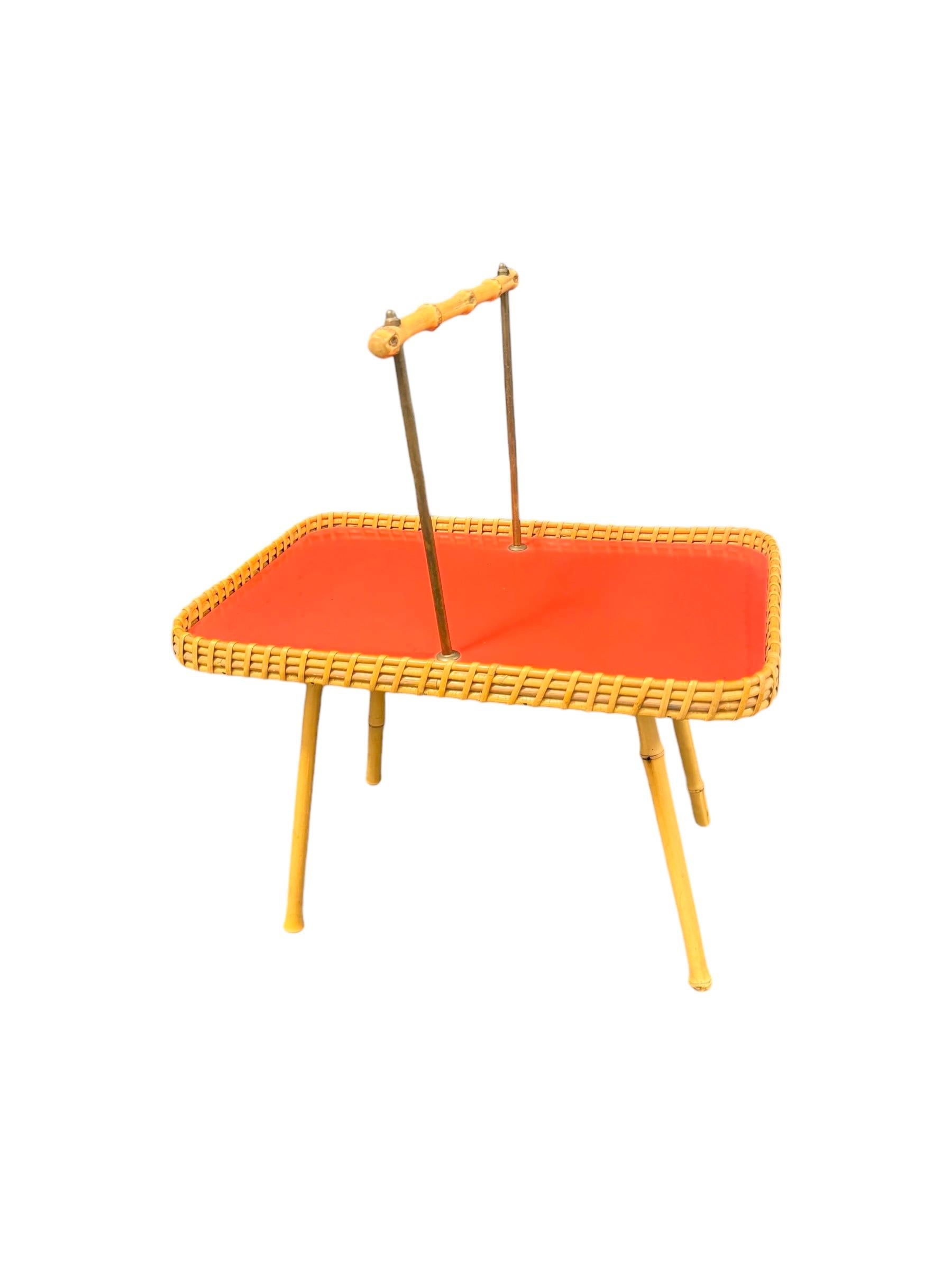 Striking mid-20th century Tray Table made of metal and bamboo with hand-woven wood and wicker fittings. Wood and wicker drink tray on top. Nice addition to your home, patio or garden. You can also use it as breakfast tray table to have a nice