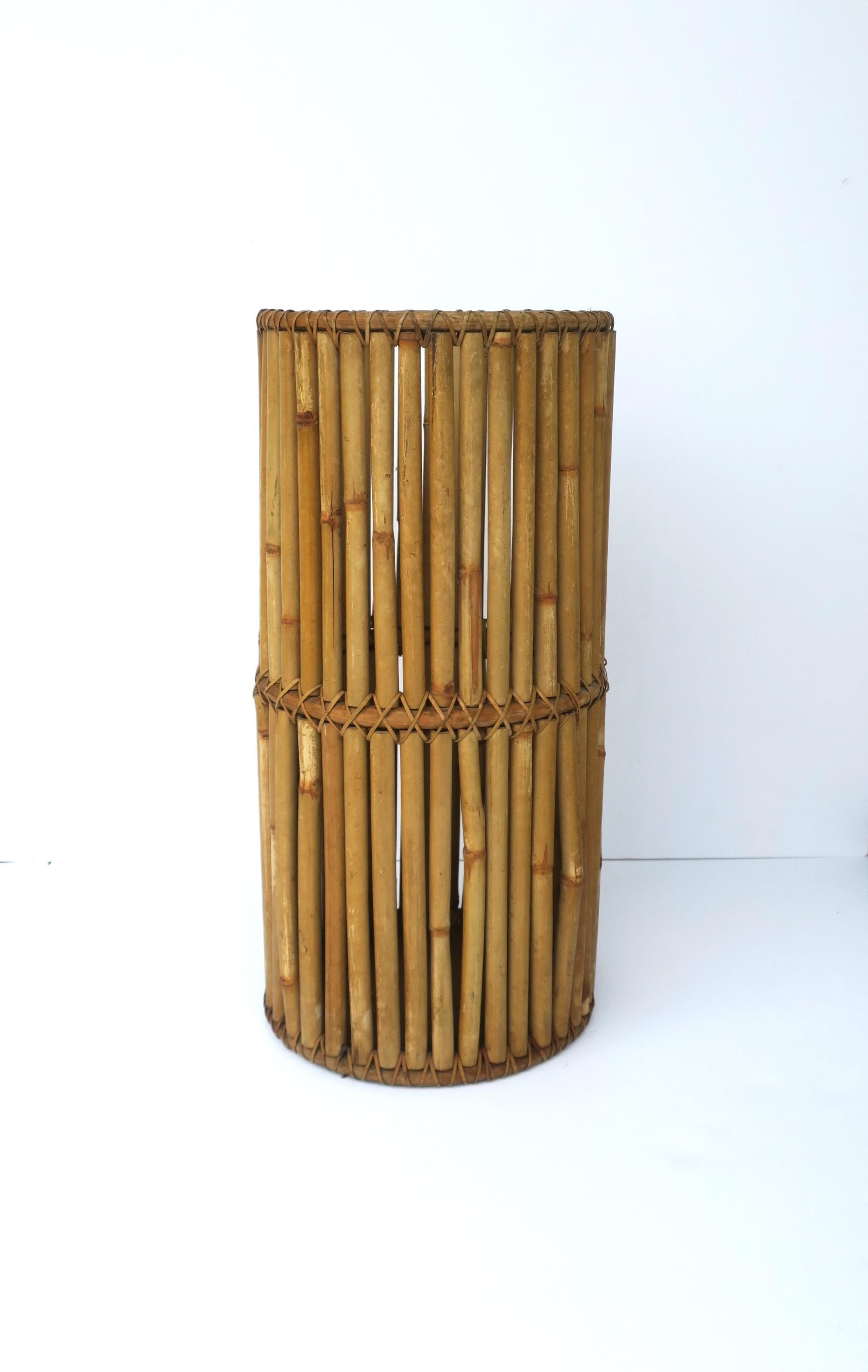 A wicker wrapped bamboo umbrella holder stand, circa mid-20th century. 

Dimensions: 10