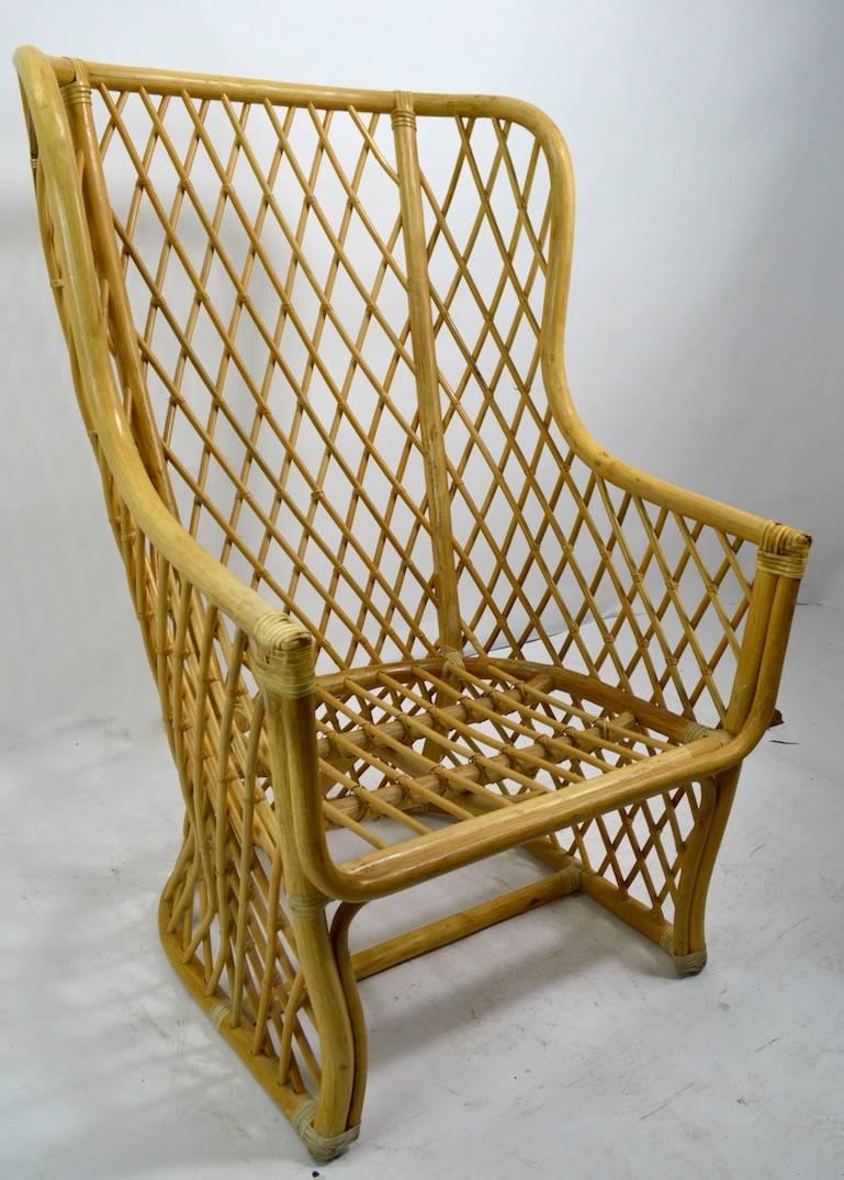 Modernist interpretation of the classic Bar Harbor wicker chair, circa 1970s-1980s possibly Italian made. This example is in very good, original condition, showing some wear to the wrapping at the hand rest, as shown. Upholstery usable but shows