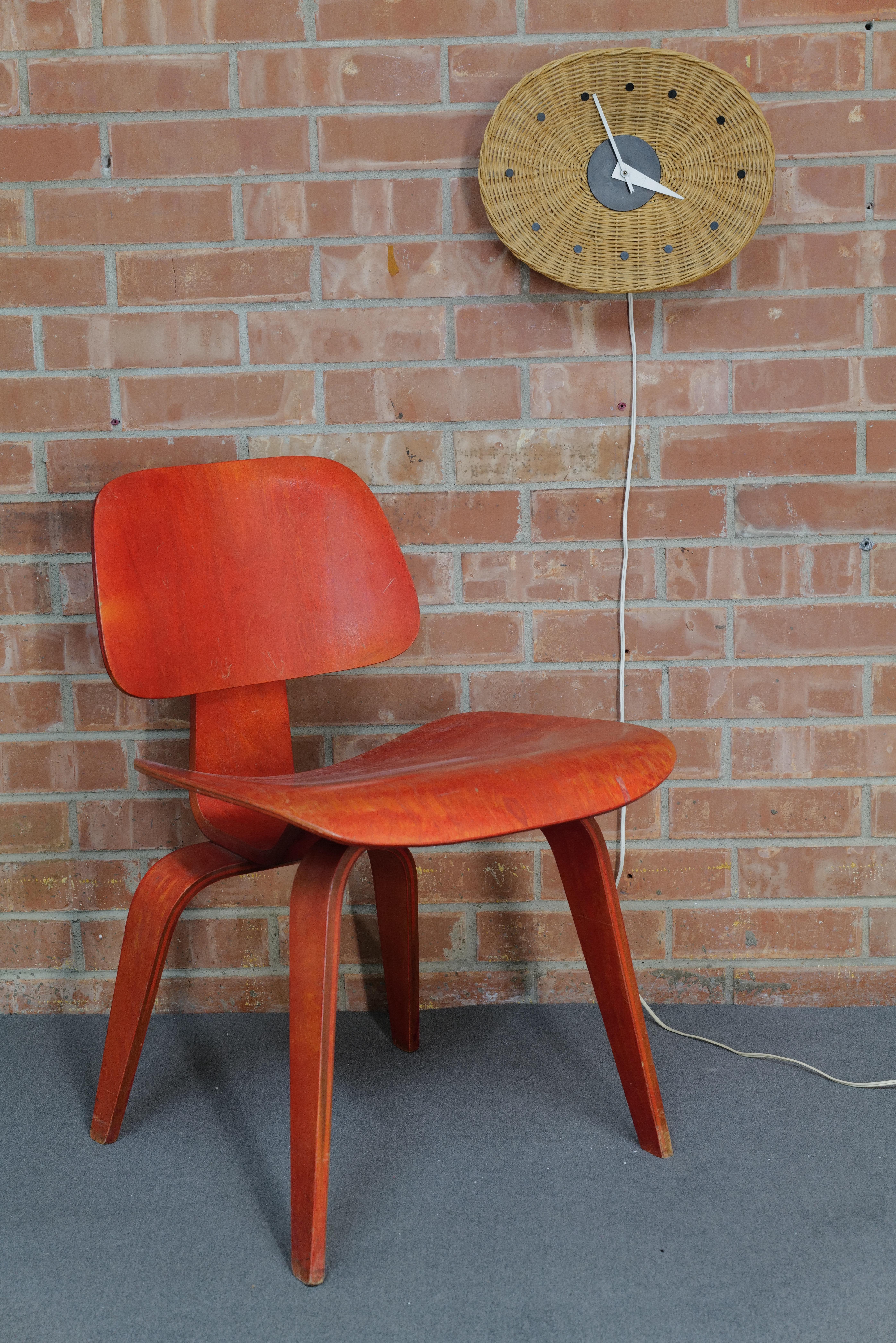 This rare wicker “Basket” wall clock, designed by George Nelson for Howard Miller, is a standout example of mid-century modern innovation and organic design. Featuring a woven wicker body that forms the clock’s circular face, the piece blends