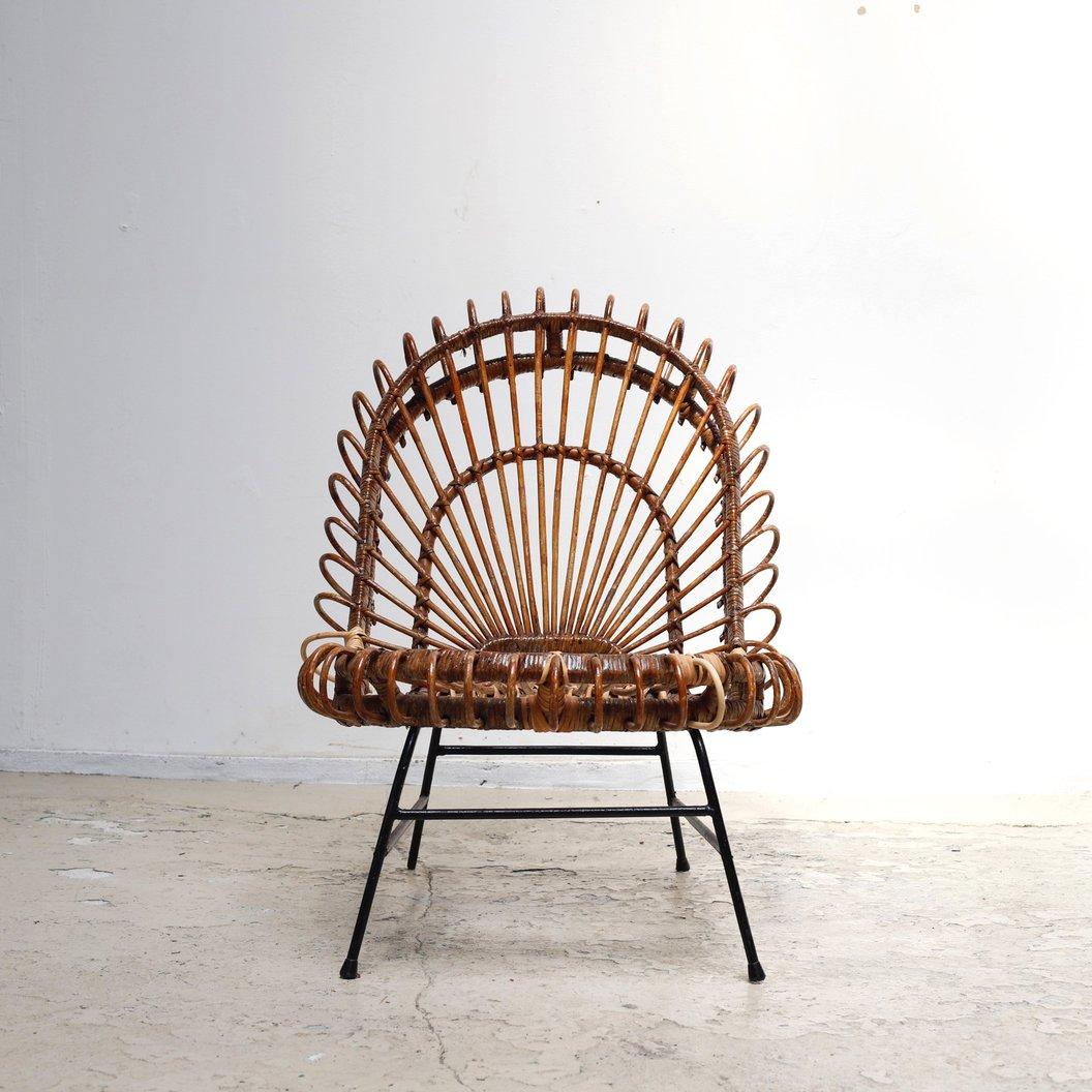 Circa 1950s / France
Size W600 D750 H820 SH380 mm 

Lounge chair by Janine Abraham and Dirk Jan Rol.
It is a masterpiece that combines Janine Abraham's imagination and Dirk Jan Rol's architectural construction. Abraham was mainly designed the rattan