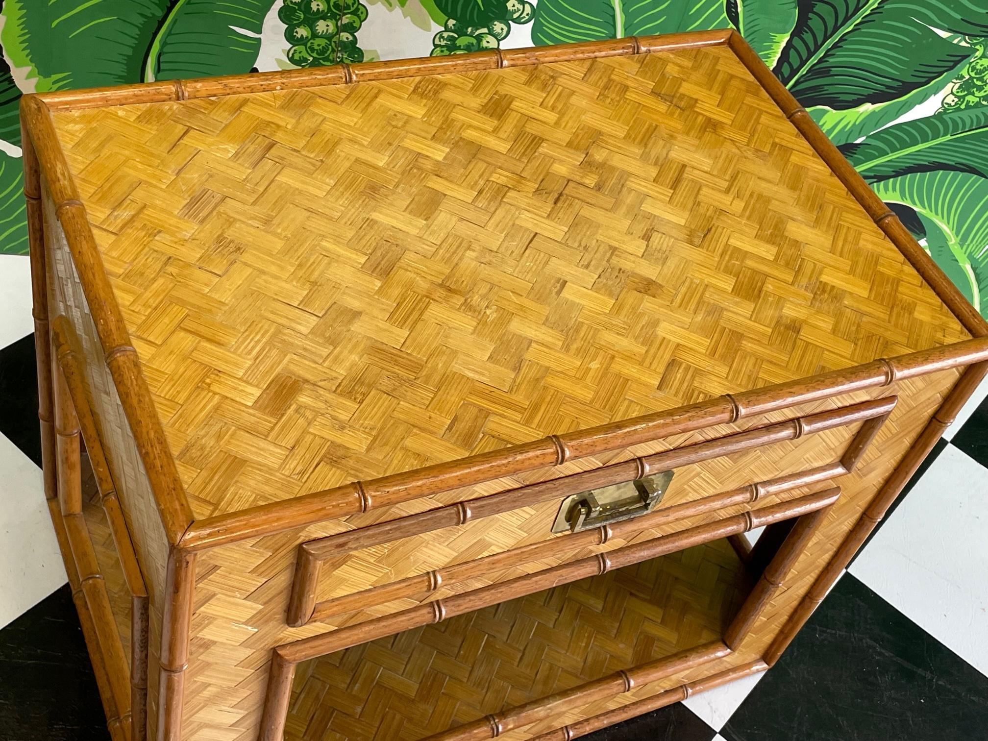 Faux bamboo nightstand with full basketweave cane veneer. Brass campaign style hardware. Good vintage condition with imperfections consistent with age, see photos for condition details.
For a shipping quote to your exact zip code, please message us.
