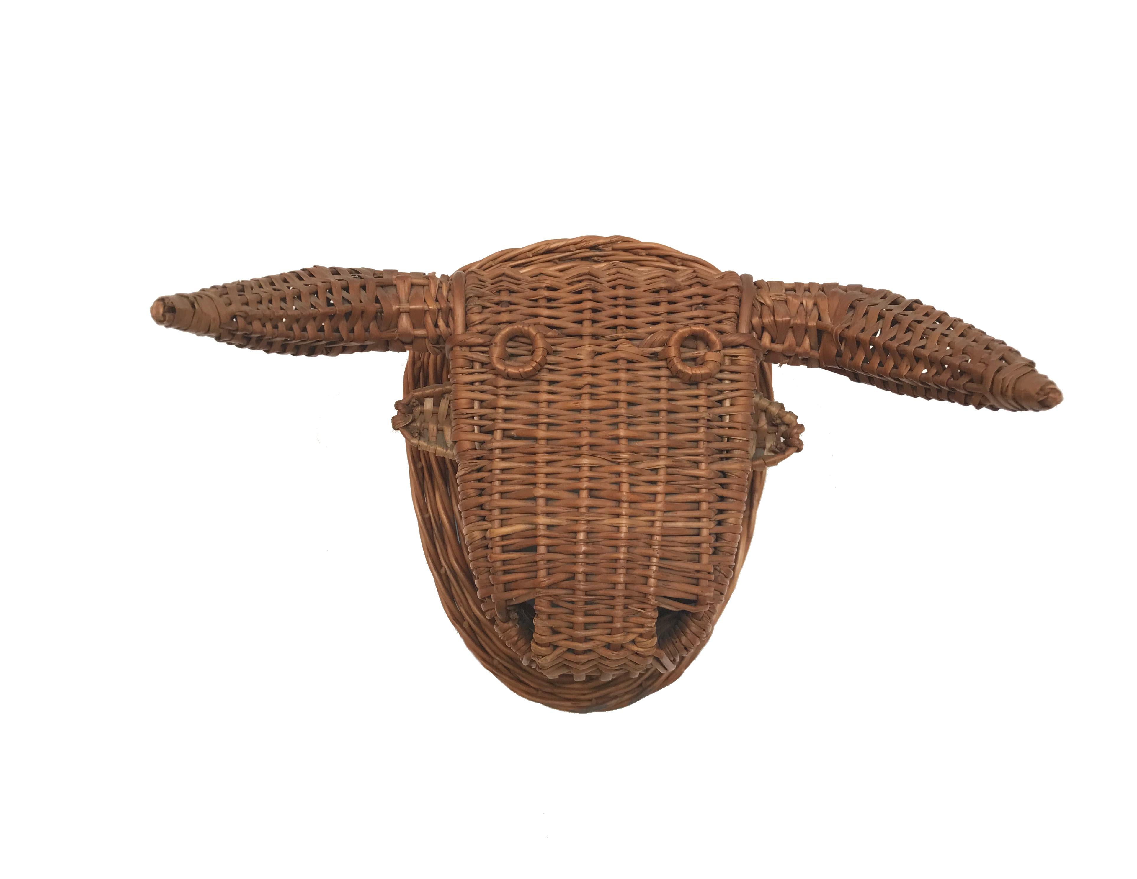 Fun and quirky Spanish woven wicker bull's head to be mounted on the wall.
