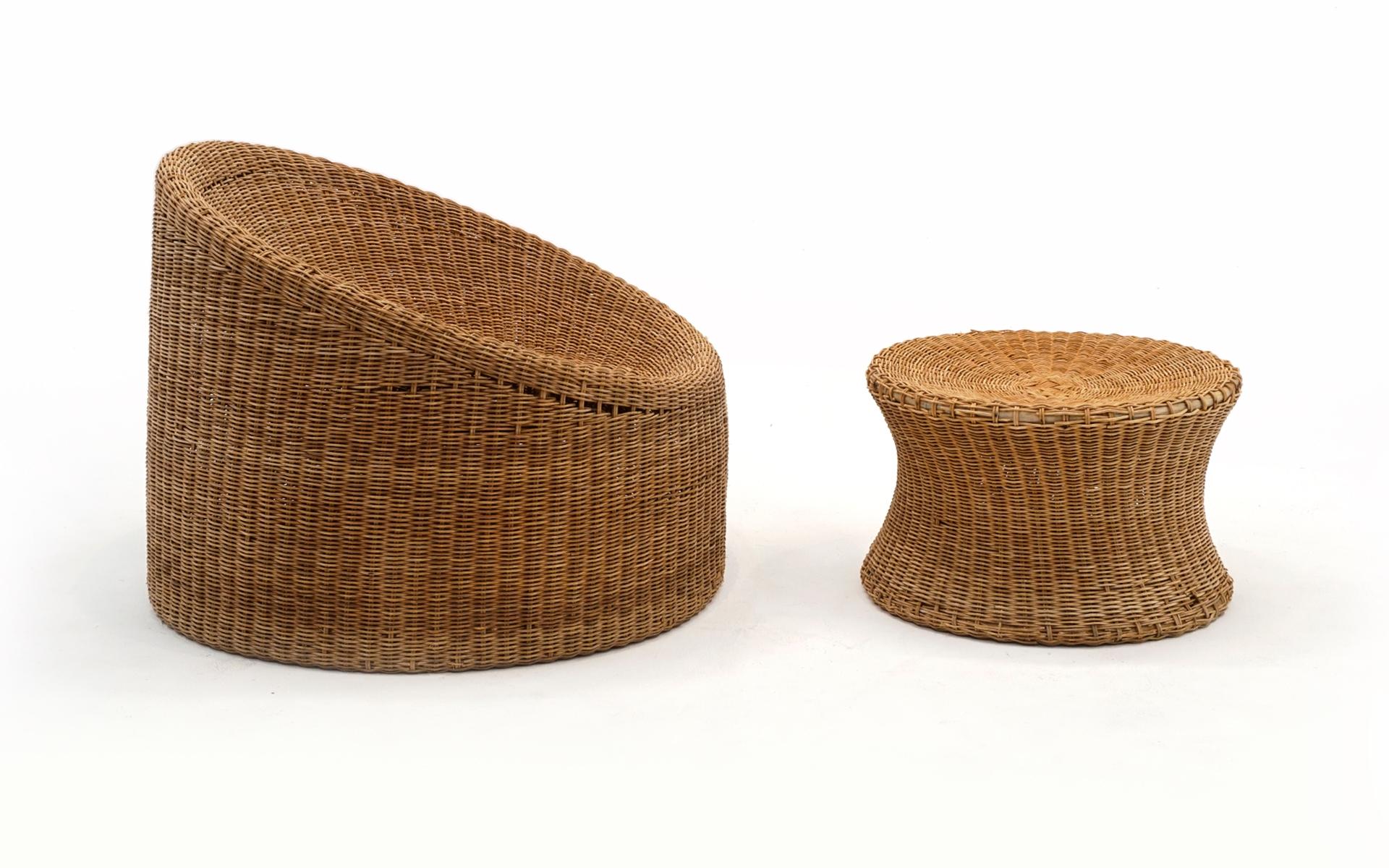Round wicker chair and ottoman designed by Eero Aarnio, Finland, 1960s. Both are structurally sound and very comfortable. The are a few breaks in the wicker and an area of lose to the edge of the ottoman (see photos) None of these are a distraction