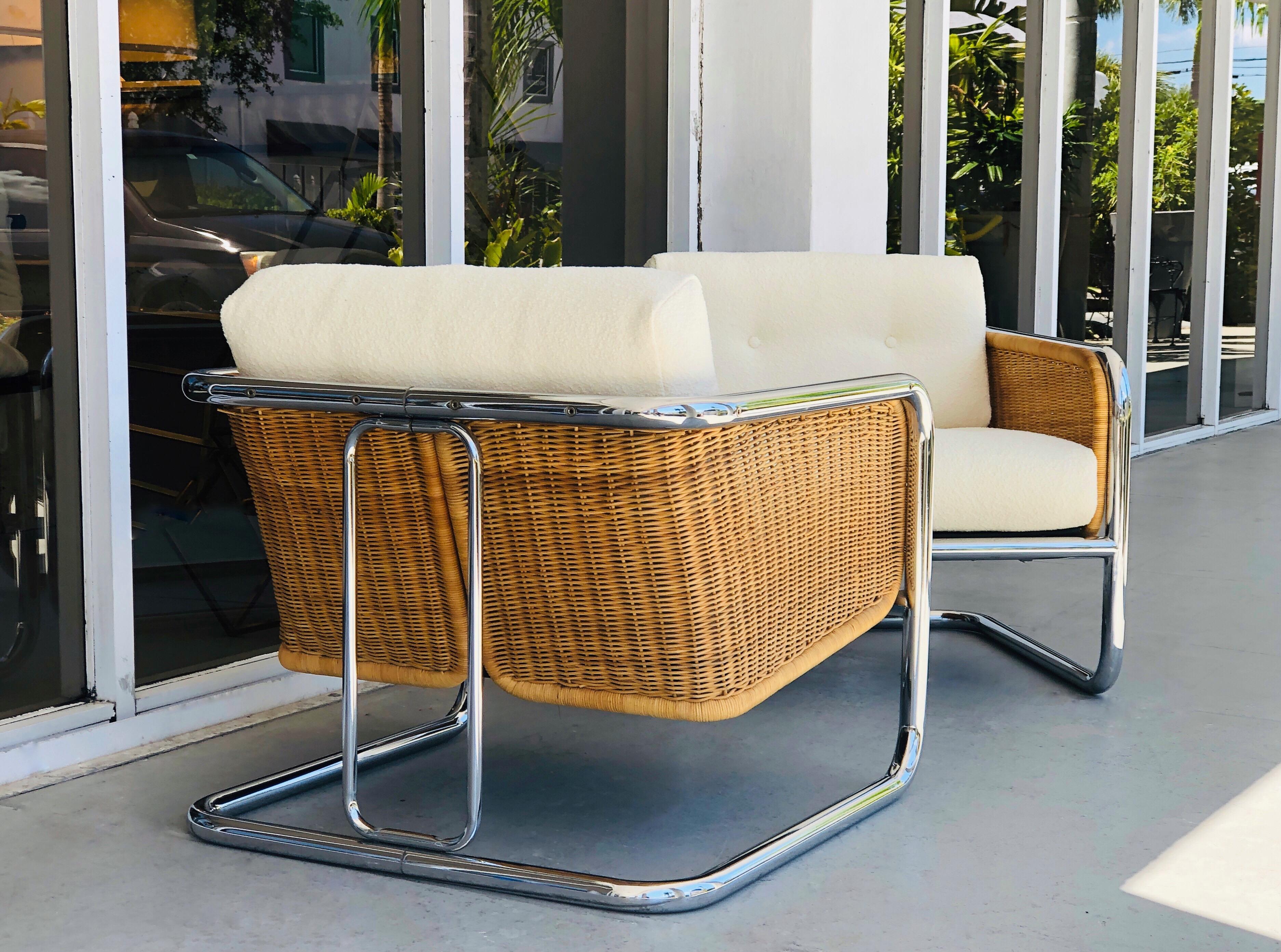 A pair of 1970s lounge chairs by Martin Visser. Chrome and wicker frame. 1970s modernism at its best. The seats and backs are removable. New upholstery.