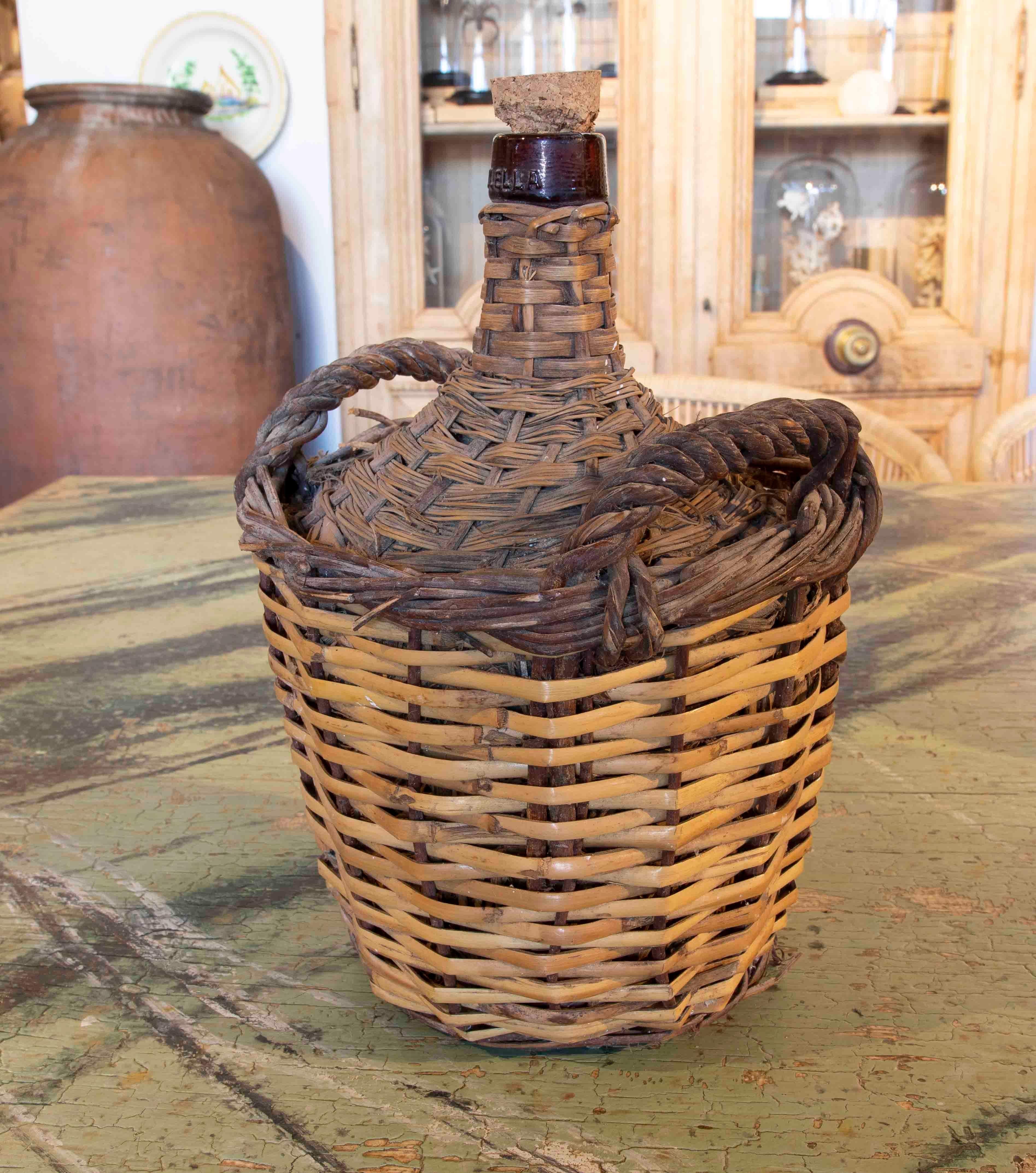 Wicker-Covered Glass Bottle Wine Holder In Good Condition In Marbella, ES