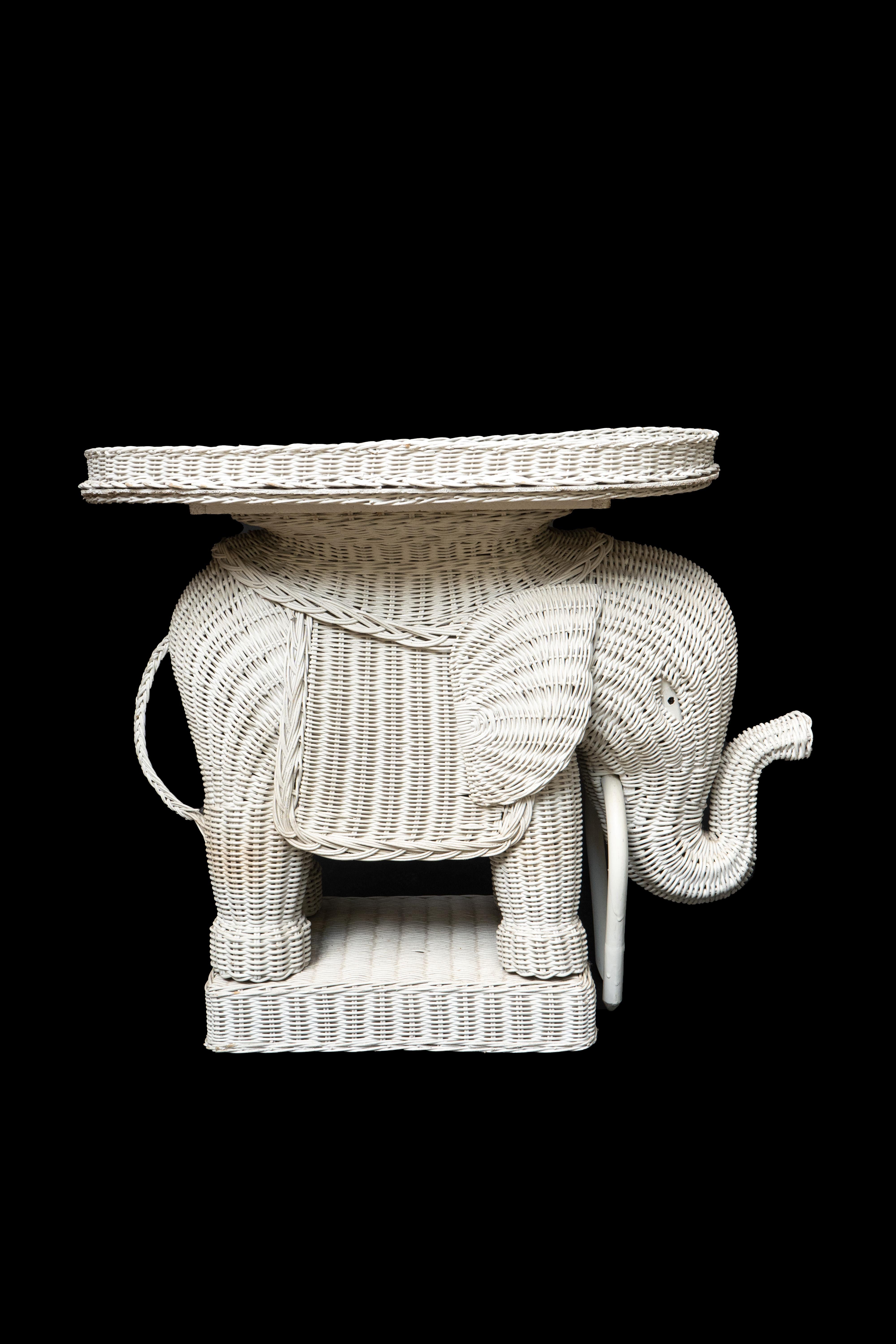 Wicker elephant side table with removable tray:

Measures: 28