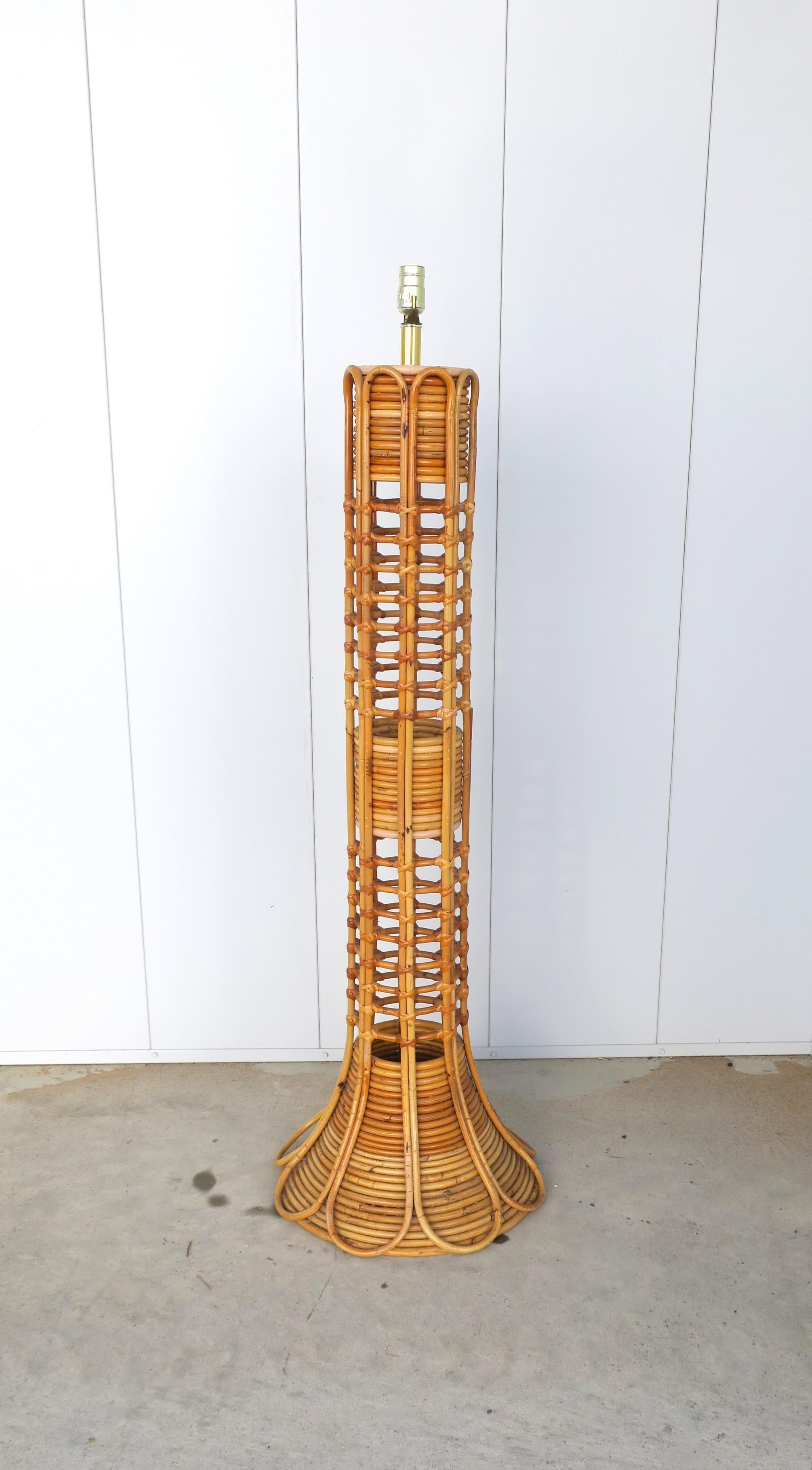 A wicker floor lamp in the style of Italian designers Gabriella Crespi and Franco Albini, circa mid to late-20th century. Harp included, just not shown in images. Lamps shade shown for photo-op only (a wider drum shade would probably look/work
