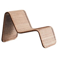 Wicker lounge chair in the manner of Tito Agnoli