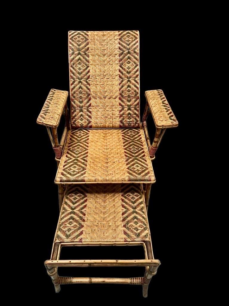 1920's Unique modern wicker ottoman lounge chair with extendable ottoman. This sculptural daybed features a long sliding ottoman that can be extended to any desired position. The chair and ottoman frames are crafted from sturdy bamboo and wicker.