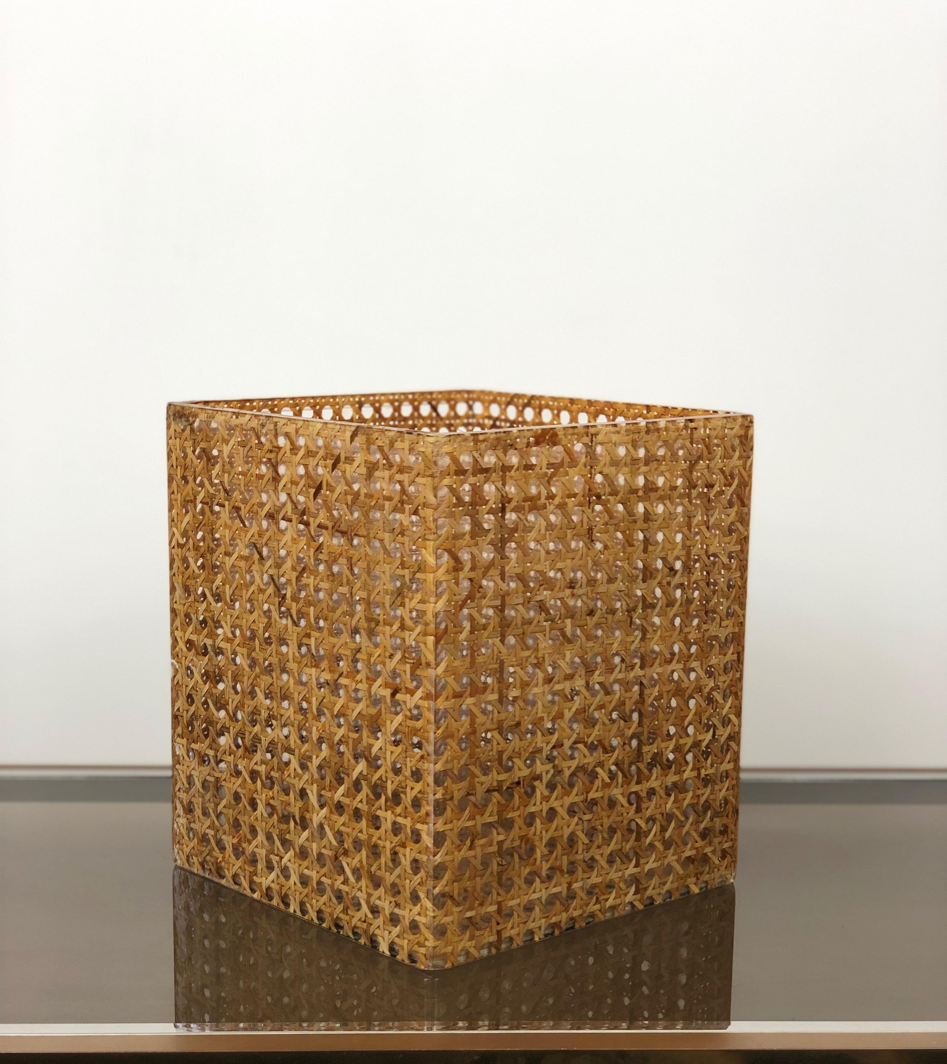 Open box which can also be used as a vase attributed to Christian Dior, Italy, 1970s. Geometric shape with real rattan cane-work embedded in a crystal clear Lucite. Great accessory for any modern interior.