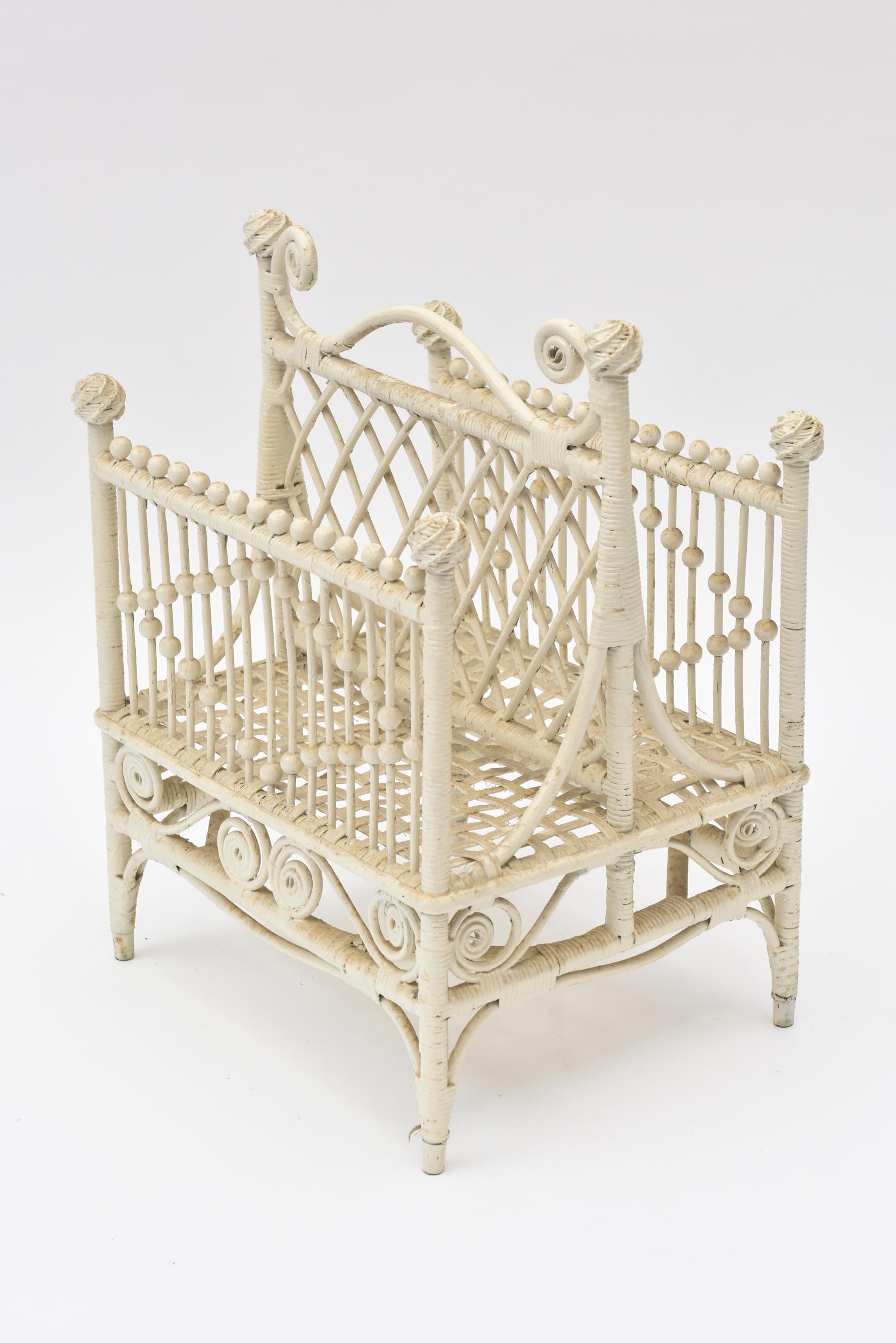 American Wicker Ornate Music or Magazine Rack with Beads Curlicues and Woven Ball Finial For Sale