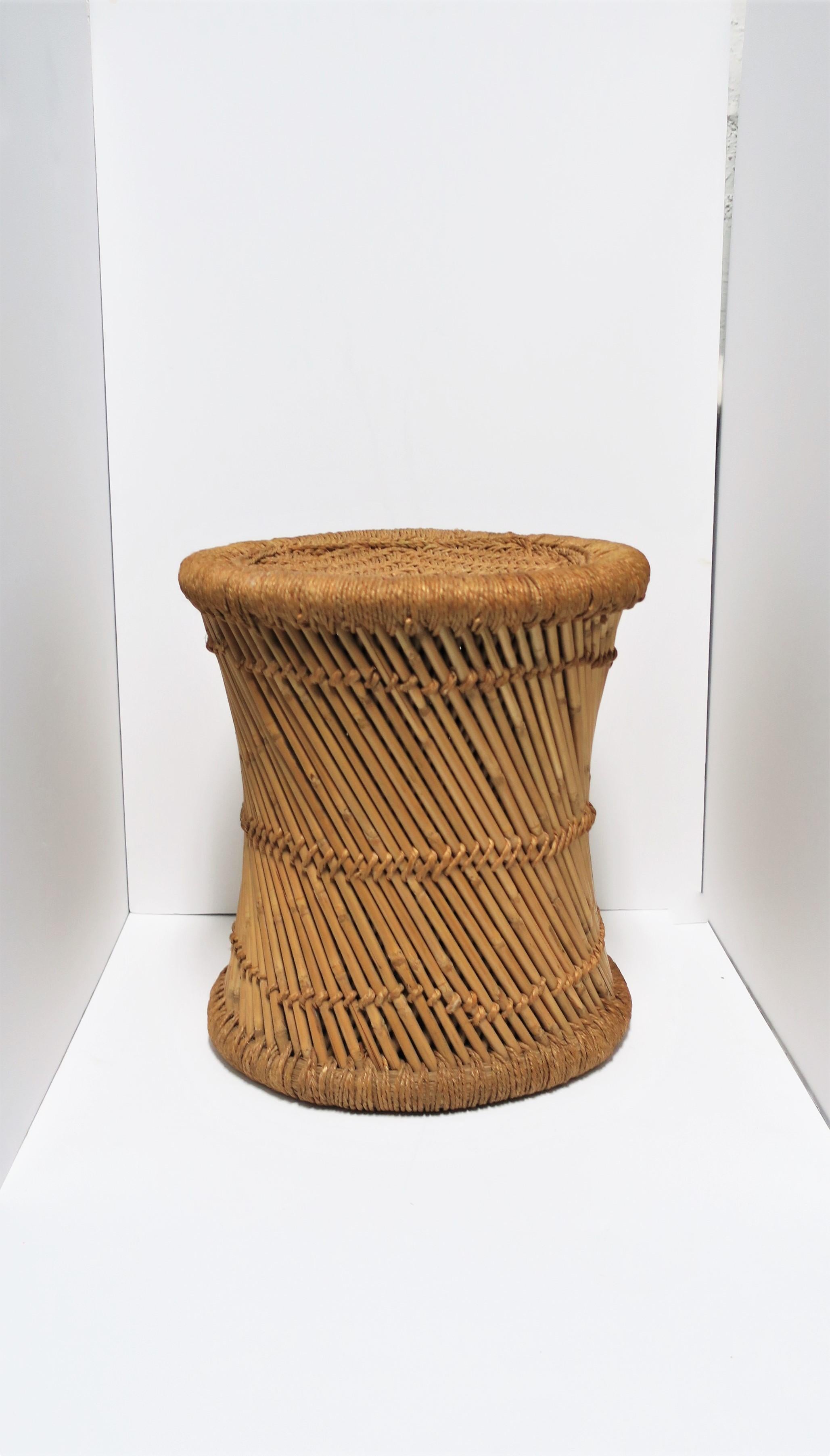 A great vintage wicker pencil reed stool or side table, circa 20th century, India. Stool is sturdy and well made and can support a human being (as intended.) Stool can also double as side table providing there's a stabile environment on top for a