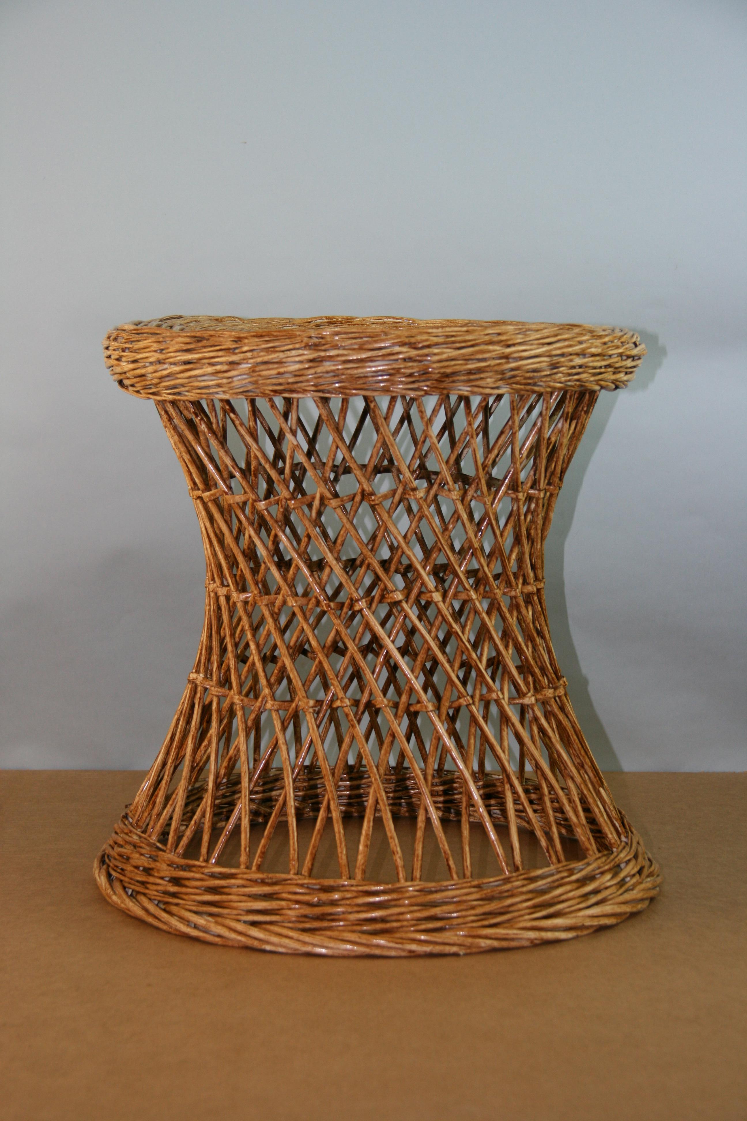 3-567 A vintage midcentury wicker stool  /side table with hourglass design.