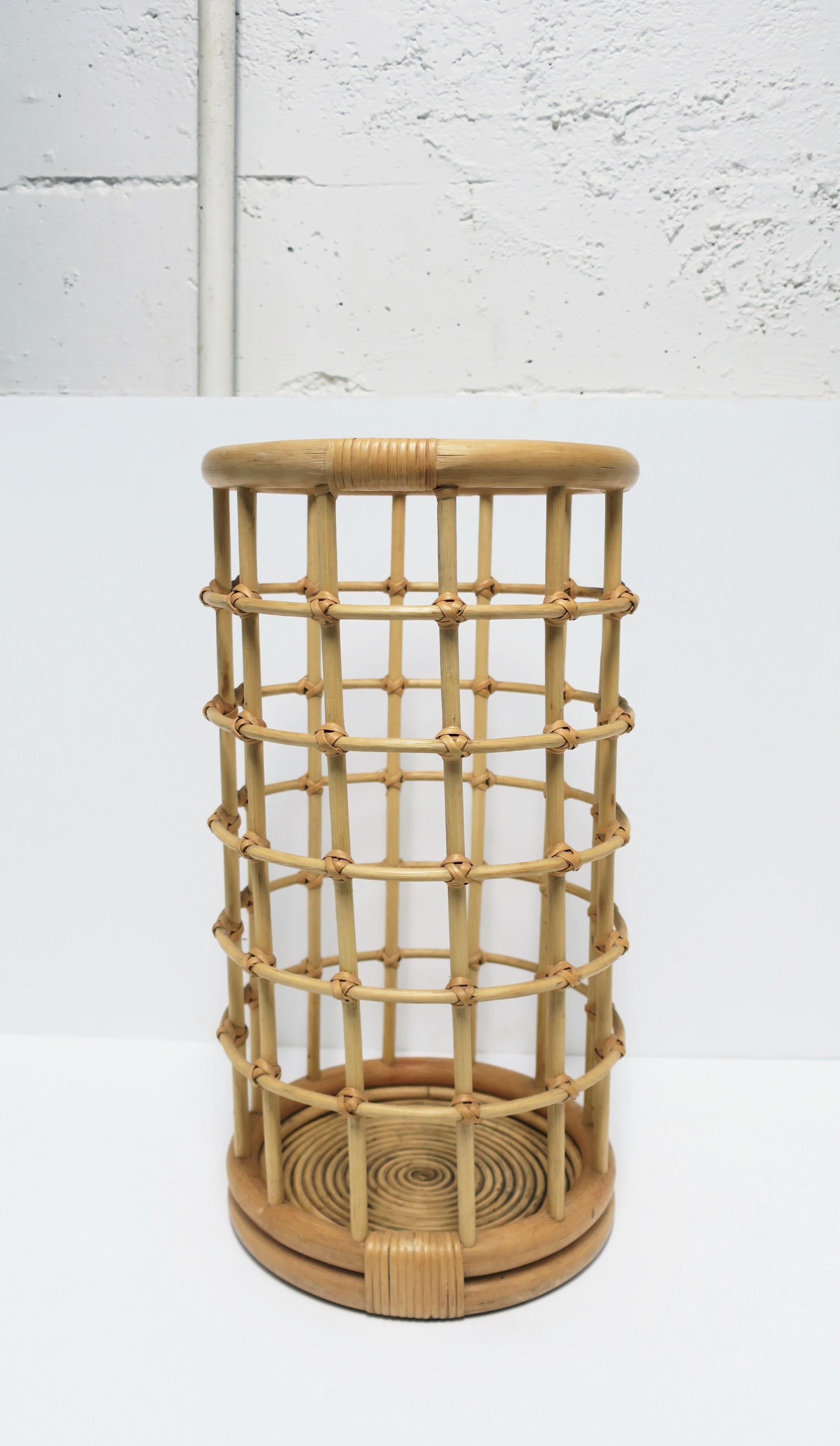 A vintage wicker rattan bentwood blond umbrella stand holder with geometric design, circa late-20th century. A rattan construction with wicker knots. Dimensions: 11.25