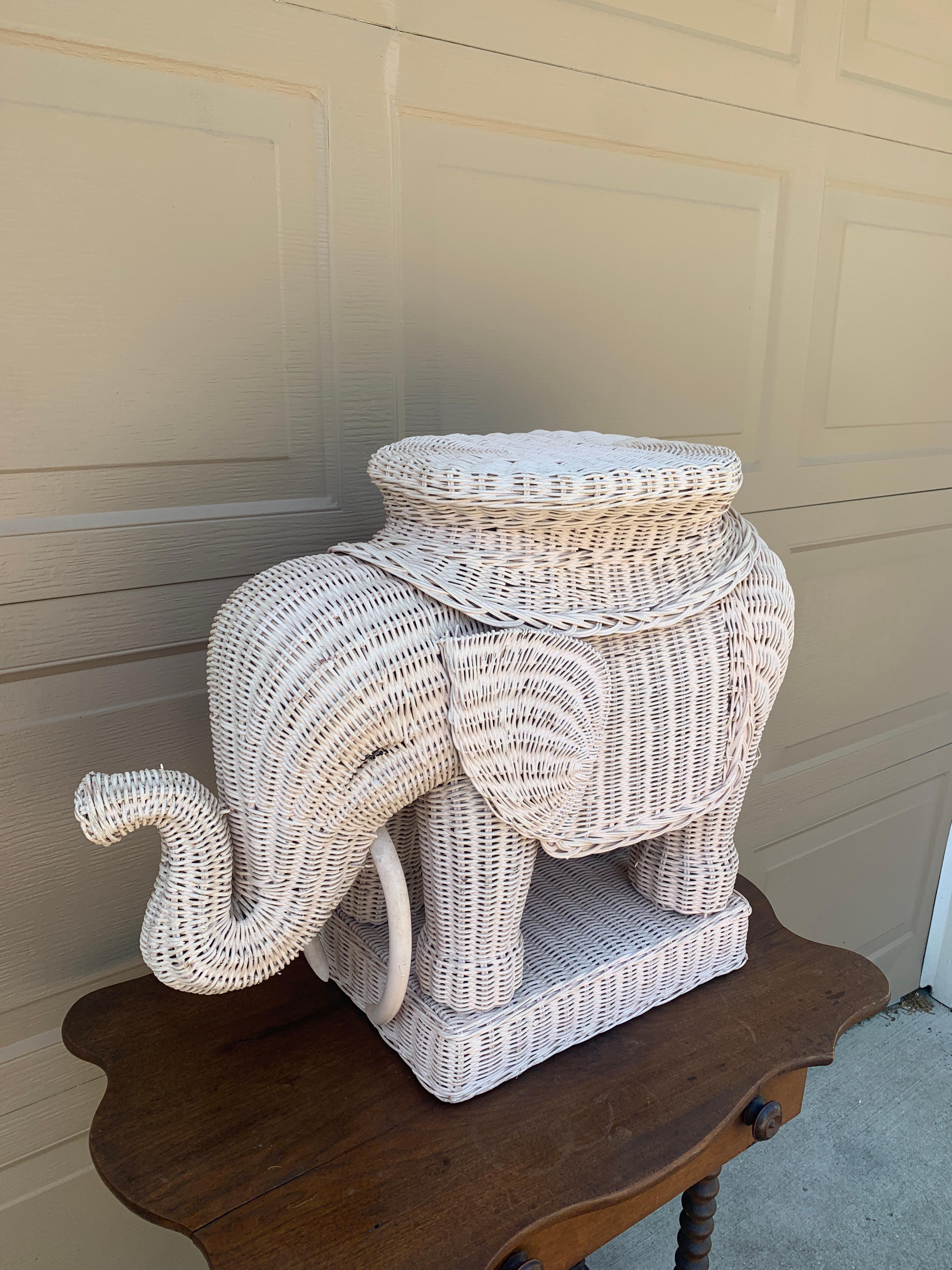 A charming Mid-Century wicker rattan white elephant garden stool or side table

USA, Circa 1970s

Measures: 27
