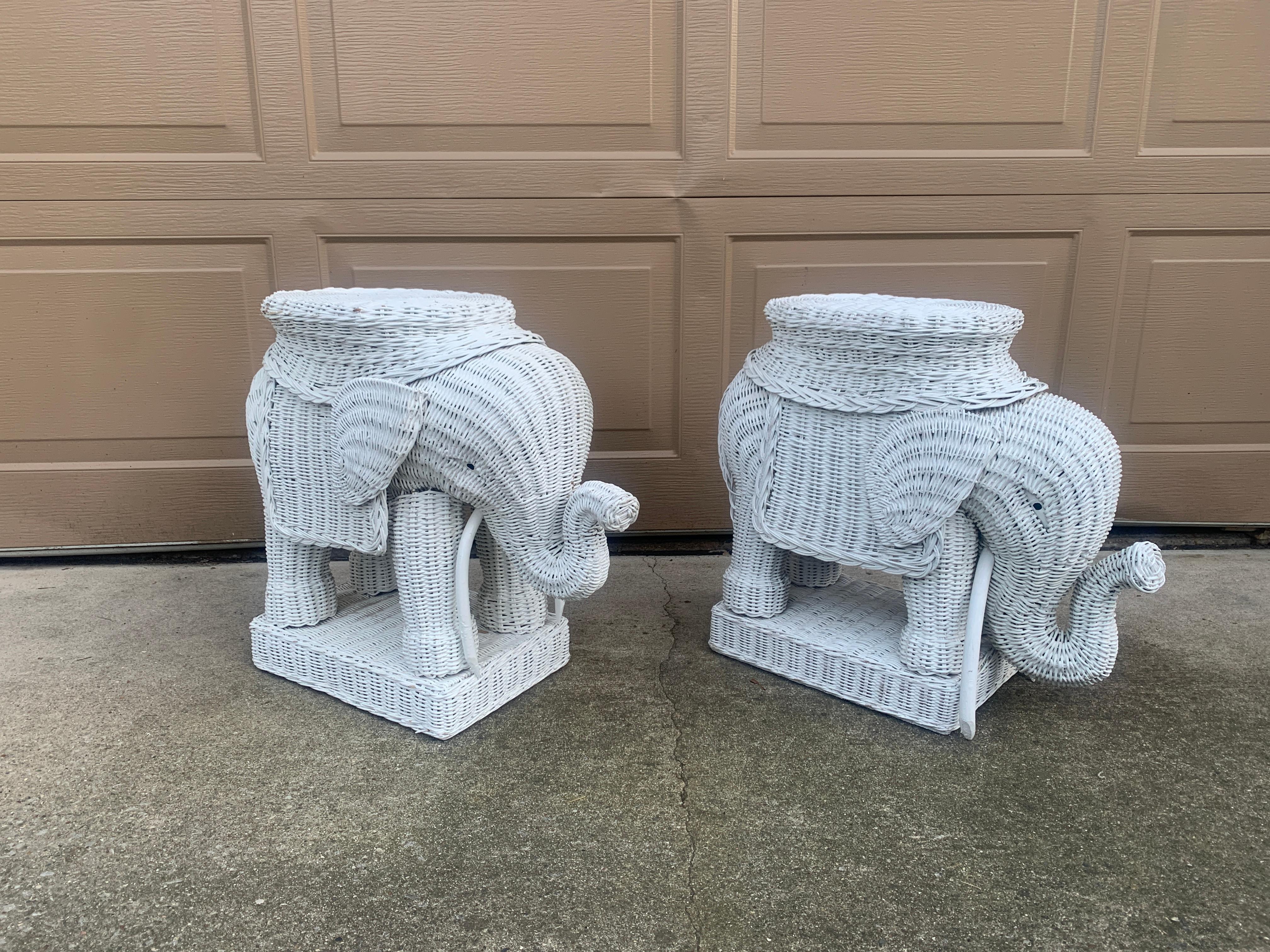 A charming pair of Mid-Century wicker rattan white elephant garden stools or side tables 

USA, Circa 1970s

Measures: 28