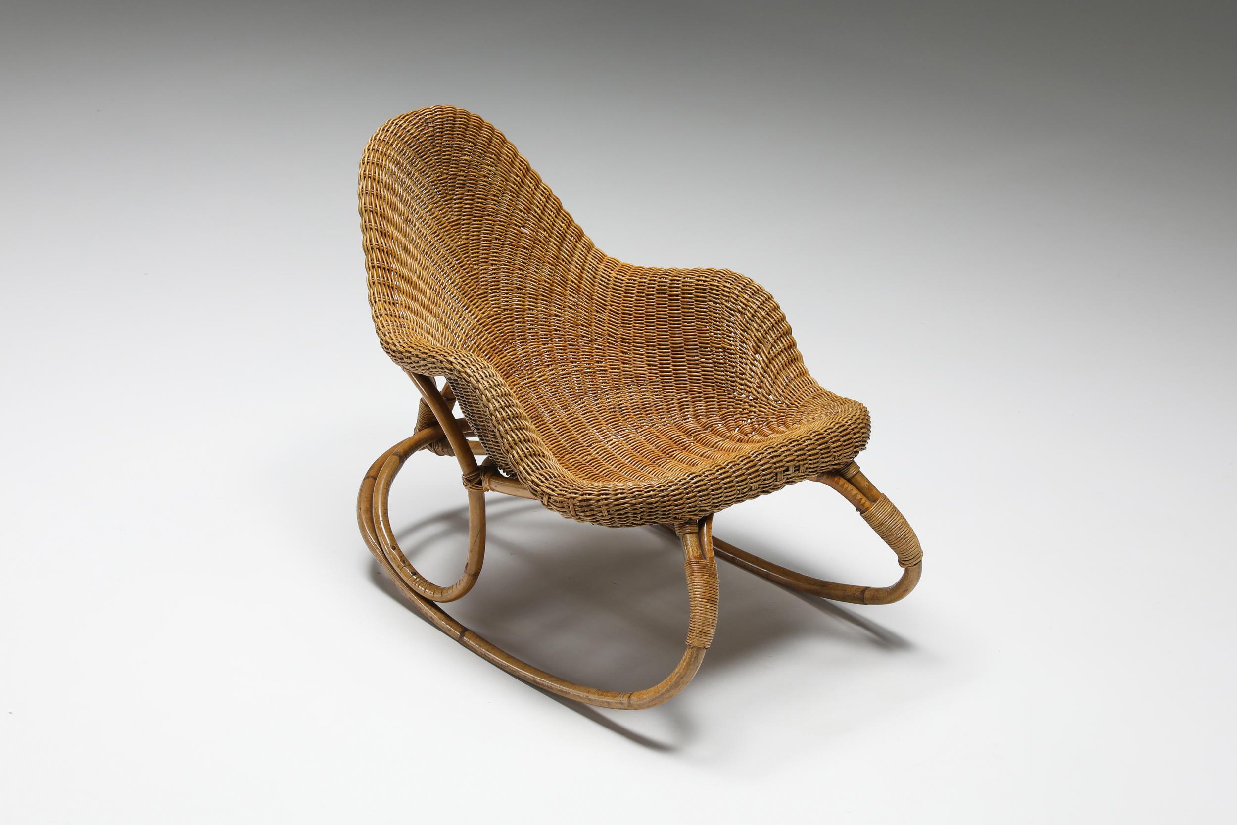Wicker Rocking Chair Art Nouveau, France; 1905; Early 20th Century; Victor Horta

Artfully processed, combined with amazing shaped lines make this comfortable rocking chair a real impressive piece with a very unique touch. With clear influences