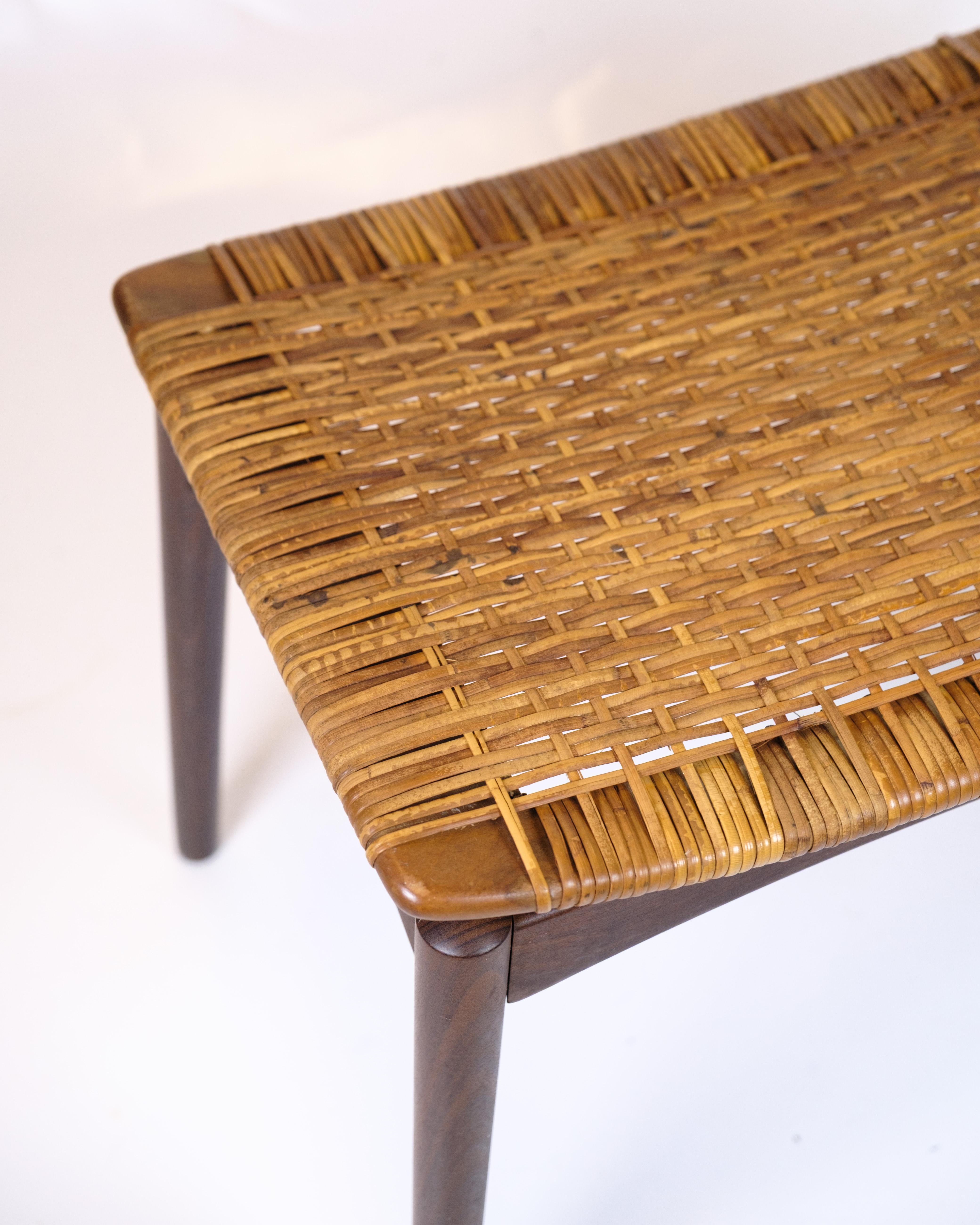 Teak wicker stool, designed by Sigfred Omann for Ølholm Møbelfabrik in the 1960s. Classic Danish design with hand-woven seat.

Designer: Sigfred Omann
Manufacturer: Ølholm Møbelfabrik
Materials: Teak and hand-woven
Period: 1960s
Dimensions: H: 43