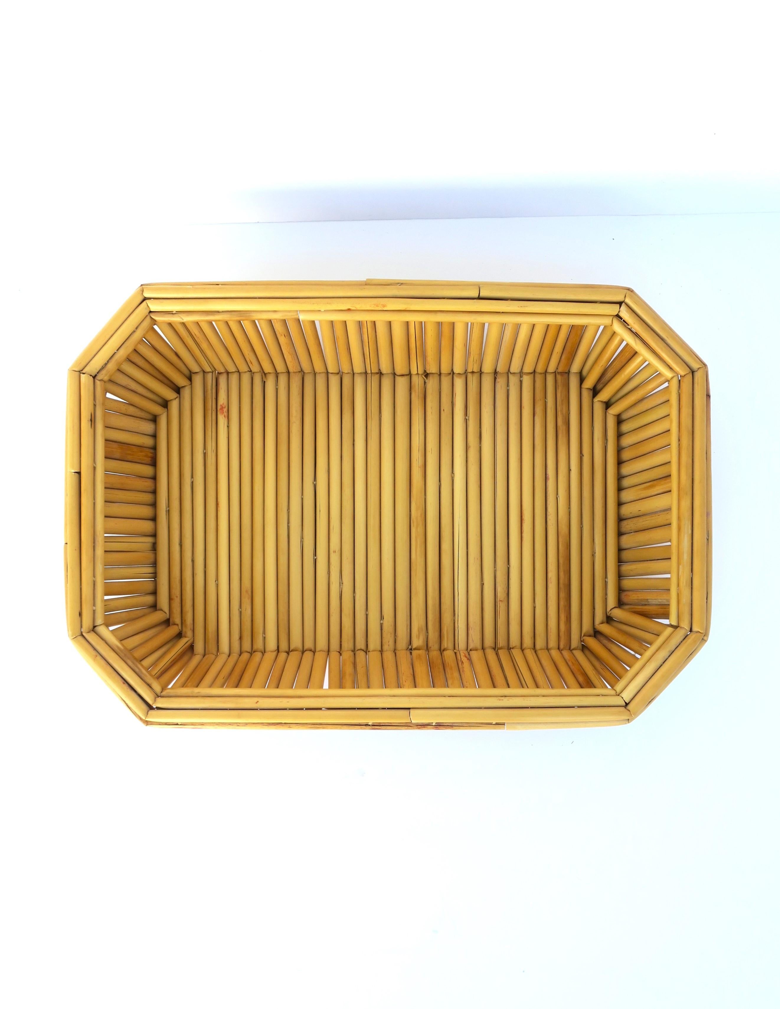 A lightweight wicker tray with an octagonal shape, circa mid to late-20th century. Tray is rectangular/octagonal. Great to use/display fruits, vegetables, seashells, etc. Dimensions: 3.25