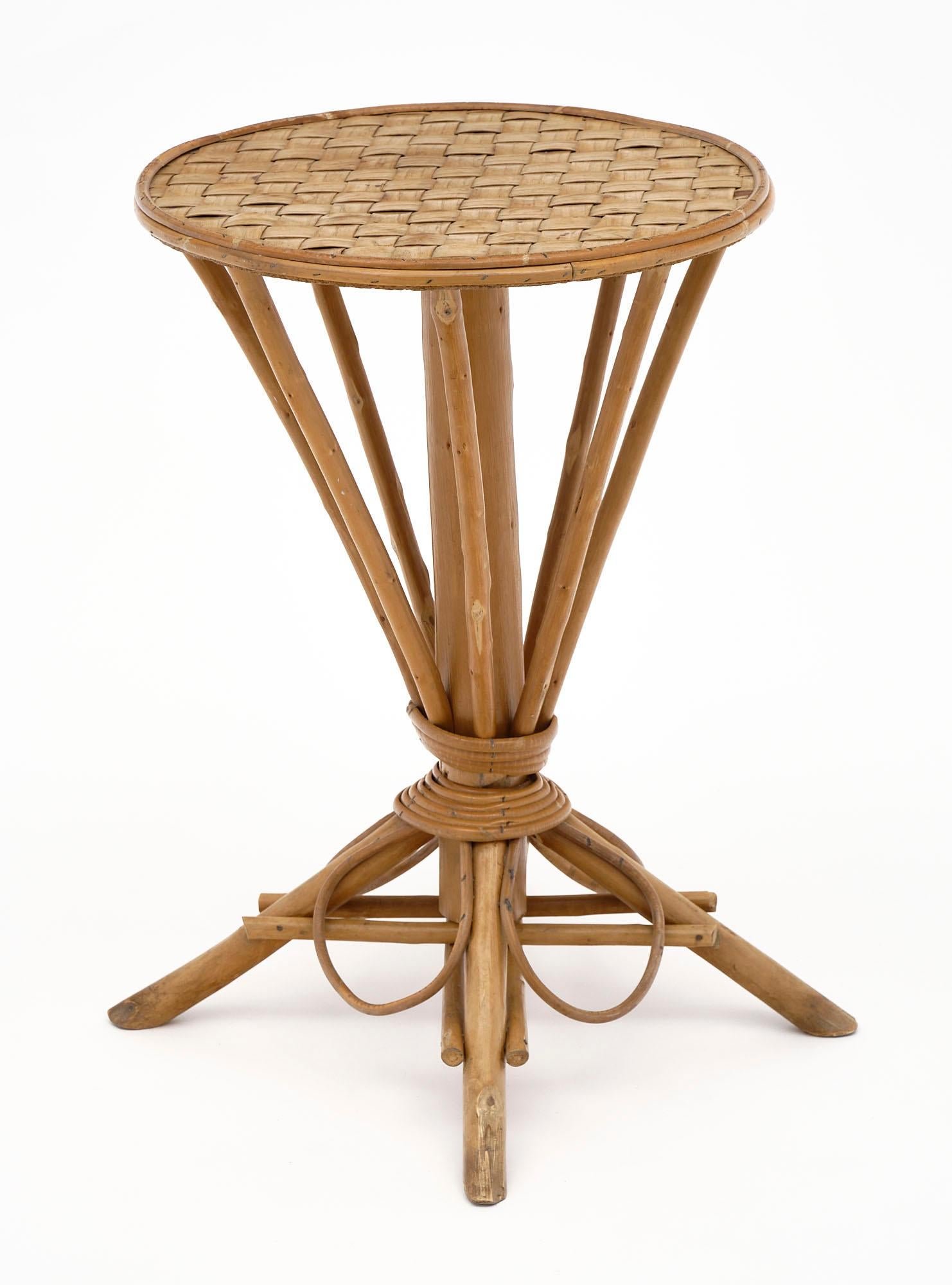Side table from France made of wicker. The top is 19.25” in diameter.