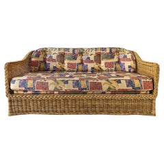 Wicker Works Braided Rattan Sofa with Upholstered Seat and Back Cushions