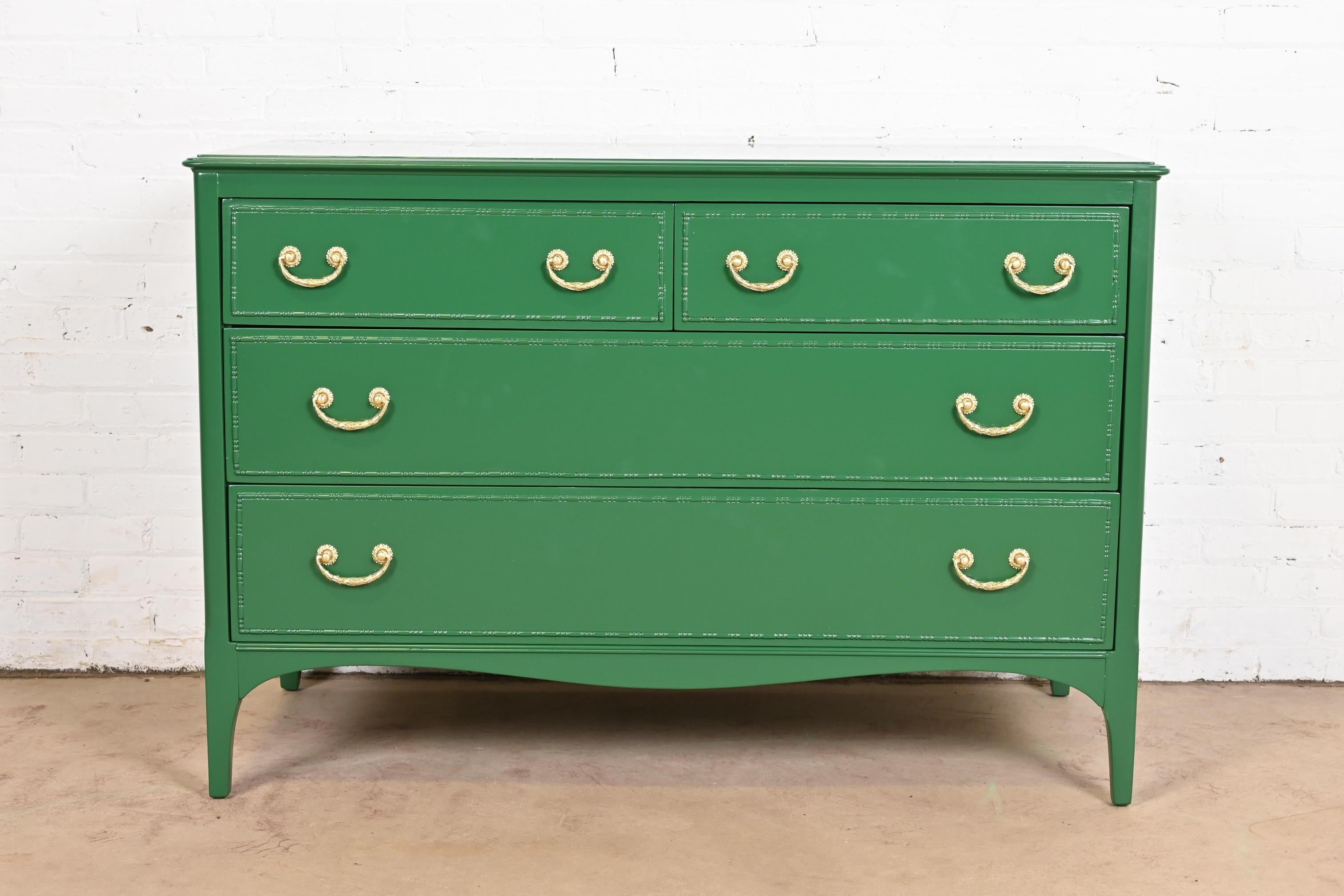 A gorgeous antique French Regency Louis XVI style four-drawer dresser or chest of drawers

By Widdicomb

USA, Circa 1920s

Green lacquered carved mahogany, with original brass hardware.

Measures: 51