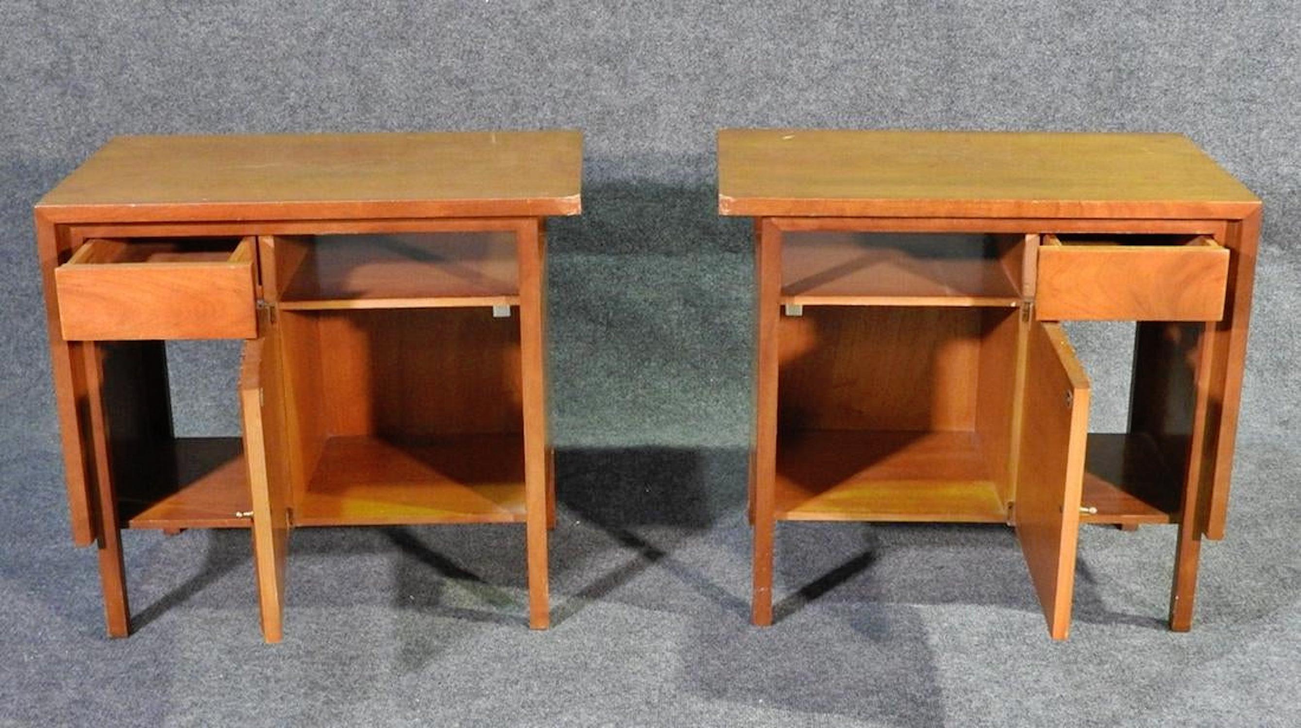 Mid-Century Modern nightstands by John Widdicomb with cabinet and drawer storage.
(Please confirm item location - NY or NJ - with dealer). 
  