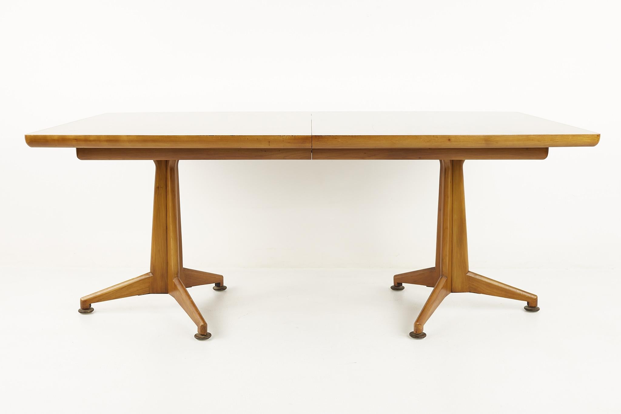 Widdicomb mid century dining table

This table measures: 72 wide x 44 deep x 29 inches high and a chair clearance of 24.75 inches; each leaf is 18 inches wide, making a maximum table width of 126 inches when all three leaves are used.

All