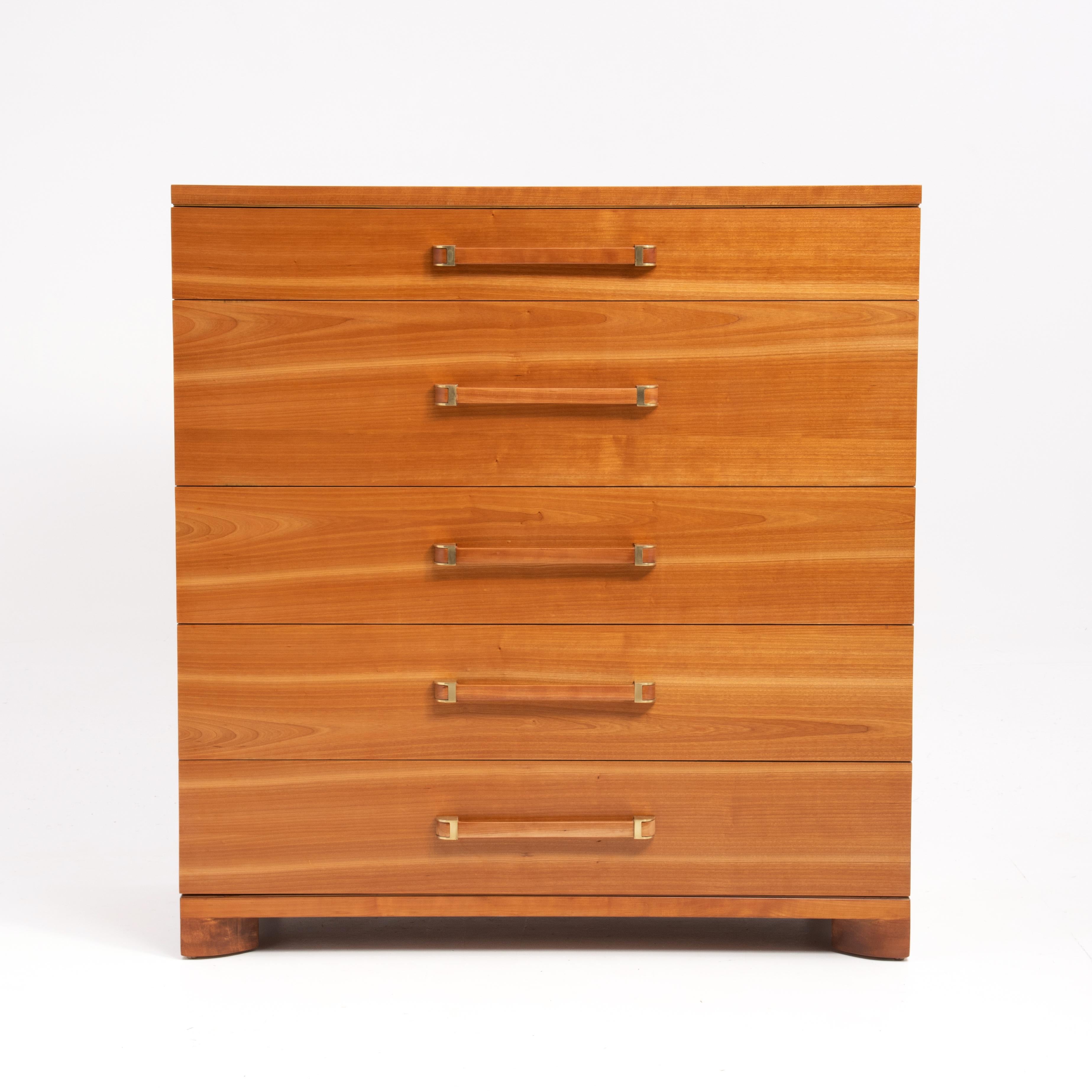 An impressive and well designed five drawer chest or dresser by the John Widdicomb Furniture Company. This is the larger version of the more common 32
