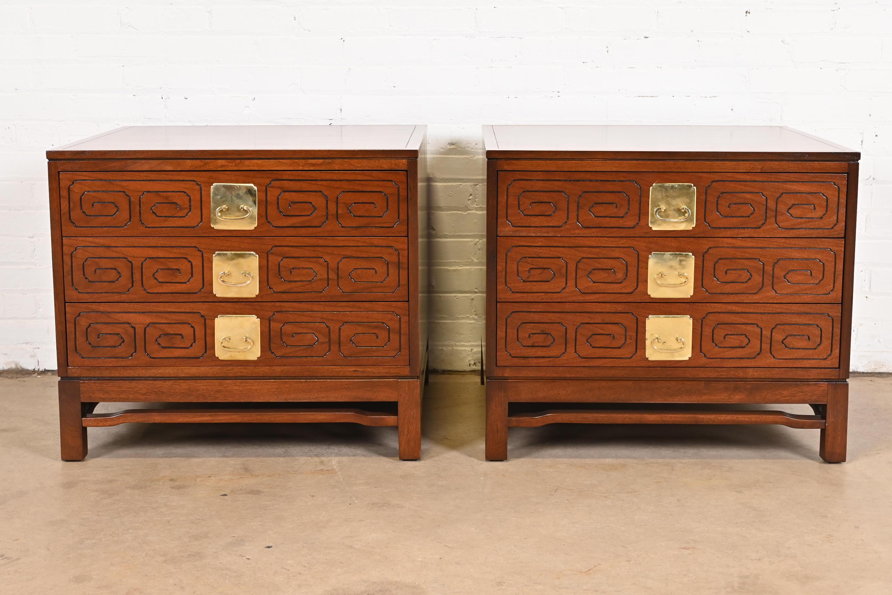 An exceptional pair of mid-century modern Hollywood Regency Chinoiserie nightstands or chests of drawers

Attributed to T.H. Robsjohn-Gibbings

By Widdicomb

USA, 1950s

Sculpted walnut, with unique etched drawer fronts and Asian-inspired