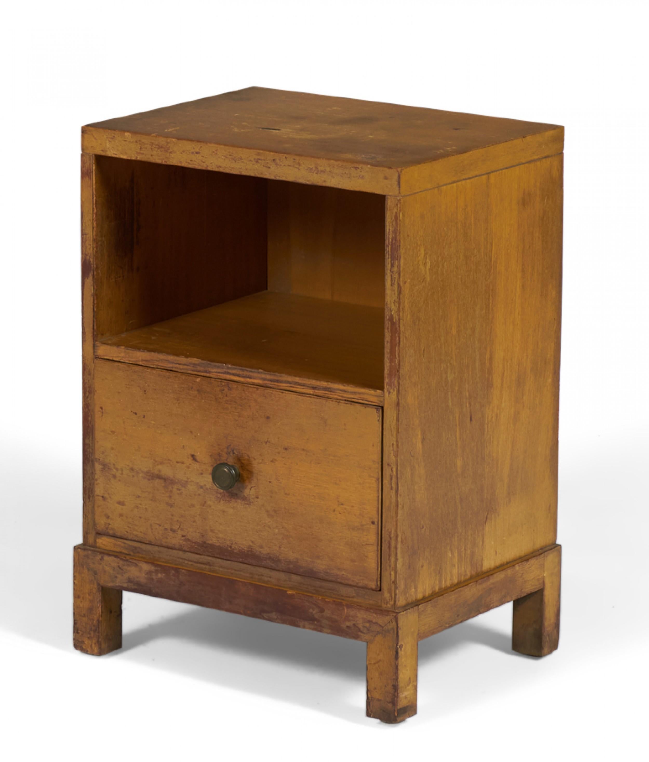 American Mid-Century (1950s) walnut nightstand with an open upper cabinet and a lower drawer with a circular metal drawer pull, resting on a square Chinese-style base. (WIDDICOMB MODERN)(Similar pieces: DUF0145A-D)
