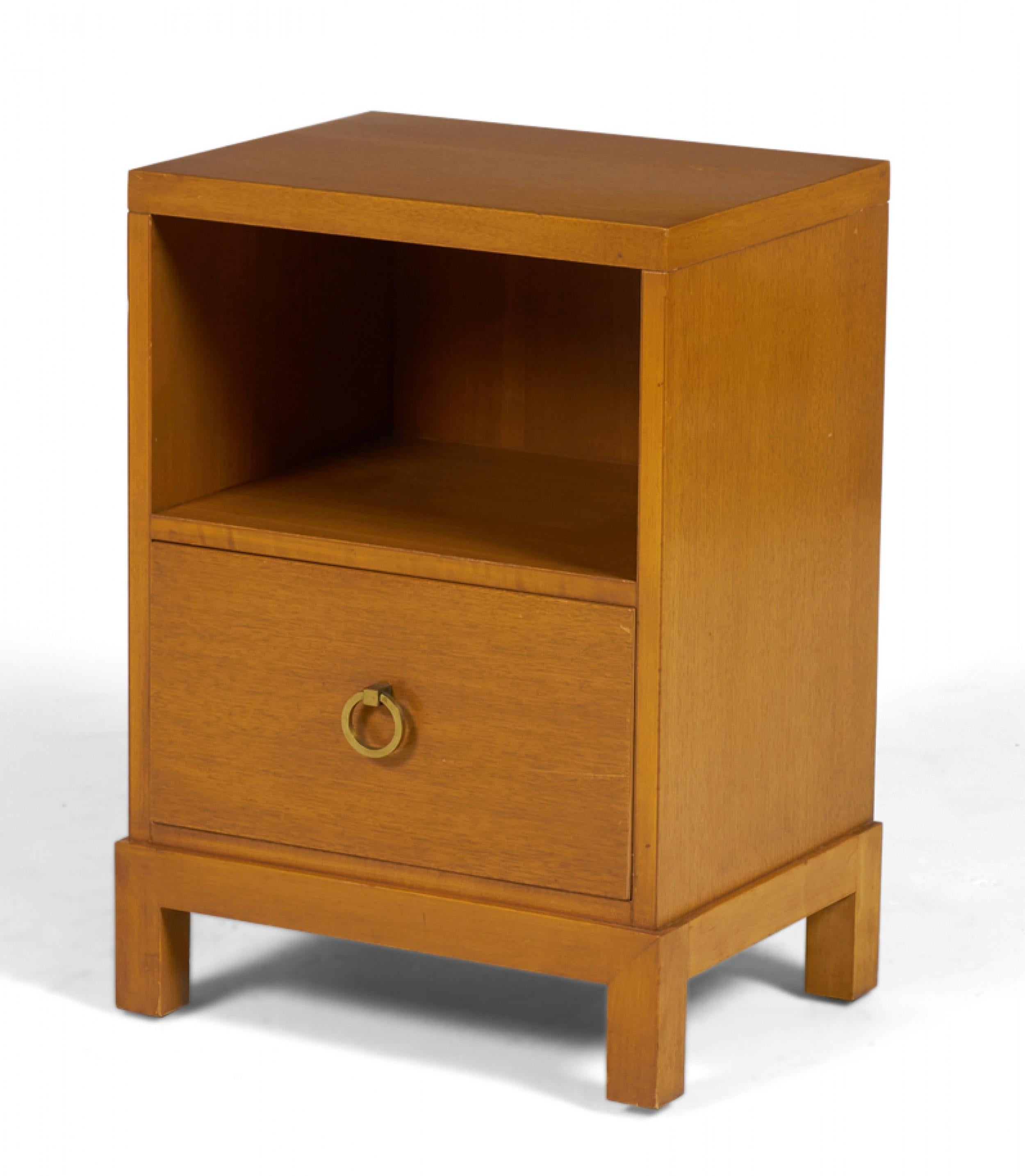 American Mid-Century (1950s) walnut nightstand with an open upper cabinet and a lower drawer with a brass ring drawer pull, resting on a square Chinese-style base. (WIDDICOMB MODERN)(Similar pieces: DUF0145A-D)
