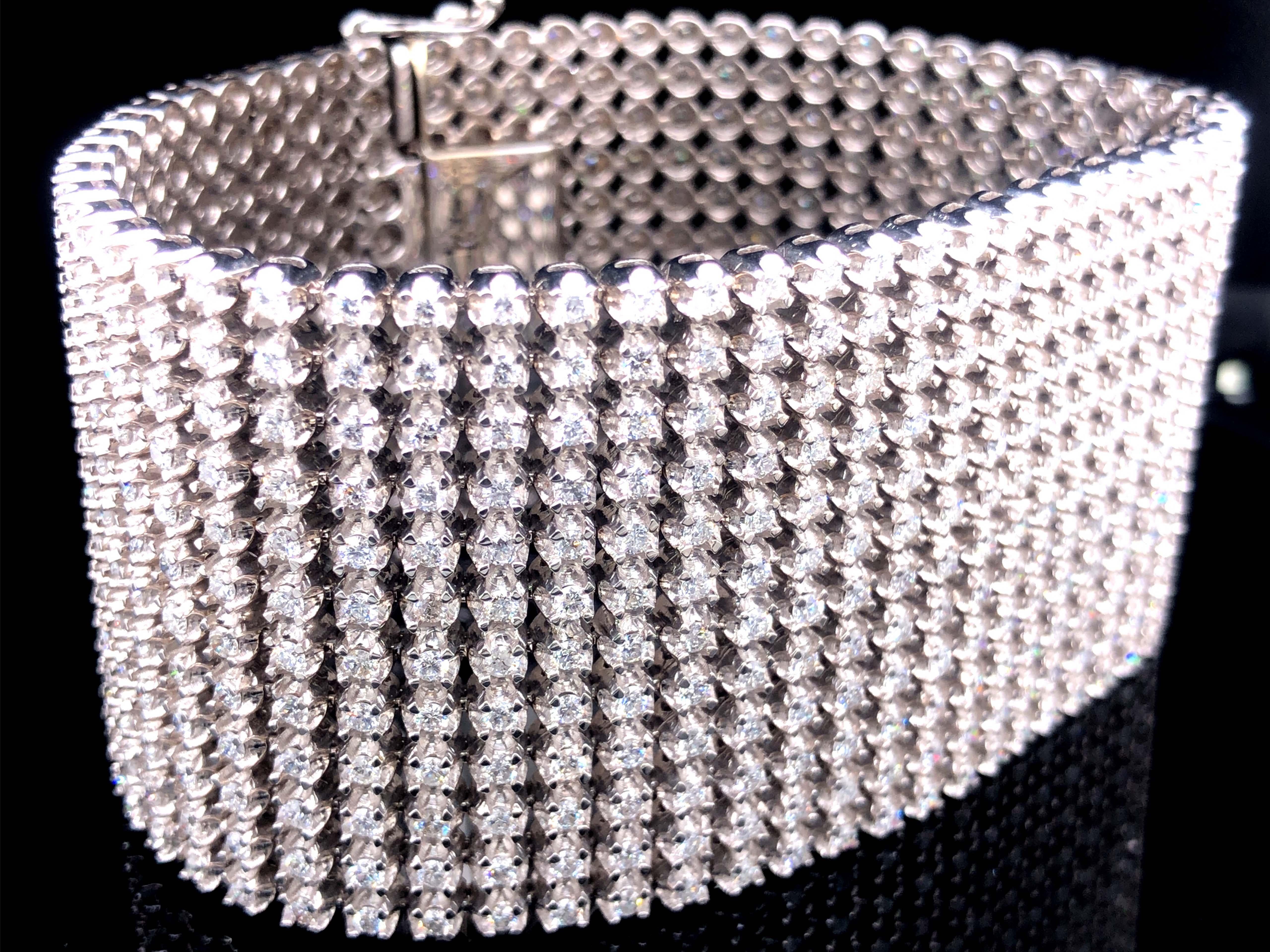 This stunning bracelet is absolutely magnificent. Featuring 672 round brilliant cut diamonds totaling approximately 20.00 carats. The bracelet is beautifully crafted in 18k white gold individual basckets that holds each diamond in four prongs and