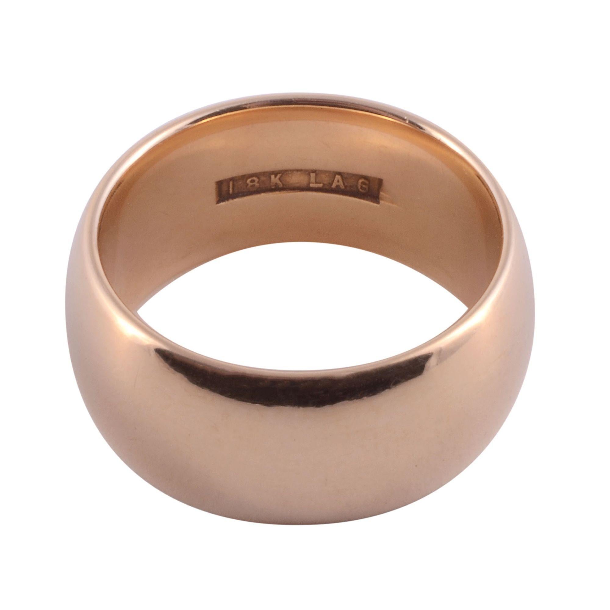 Vintage wide 18K wedding band, circa 1960. This wedding band is crafted in 18 karat yellow gold, is 9.7mm wide, size 8.5, and weighs 18 grams. [KIMH 526]