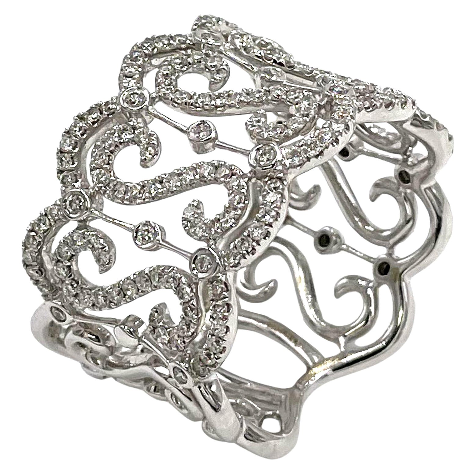 Wide 18K White Gold Ring with Repeating S Motif with Round Diamonds 0.69 Carats For Sale