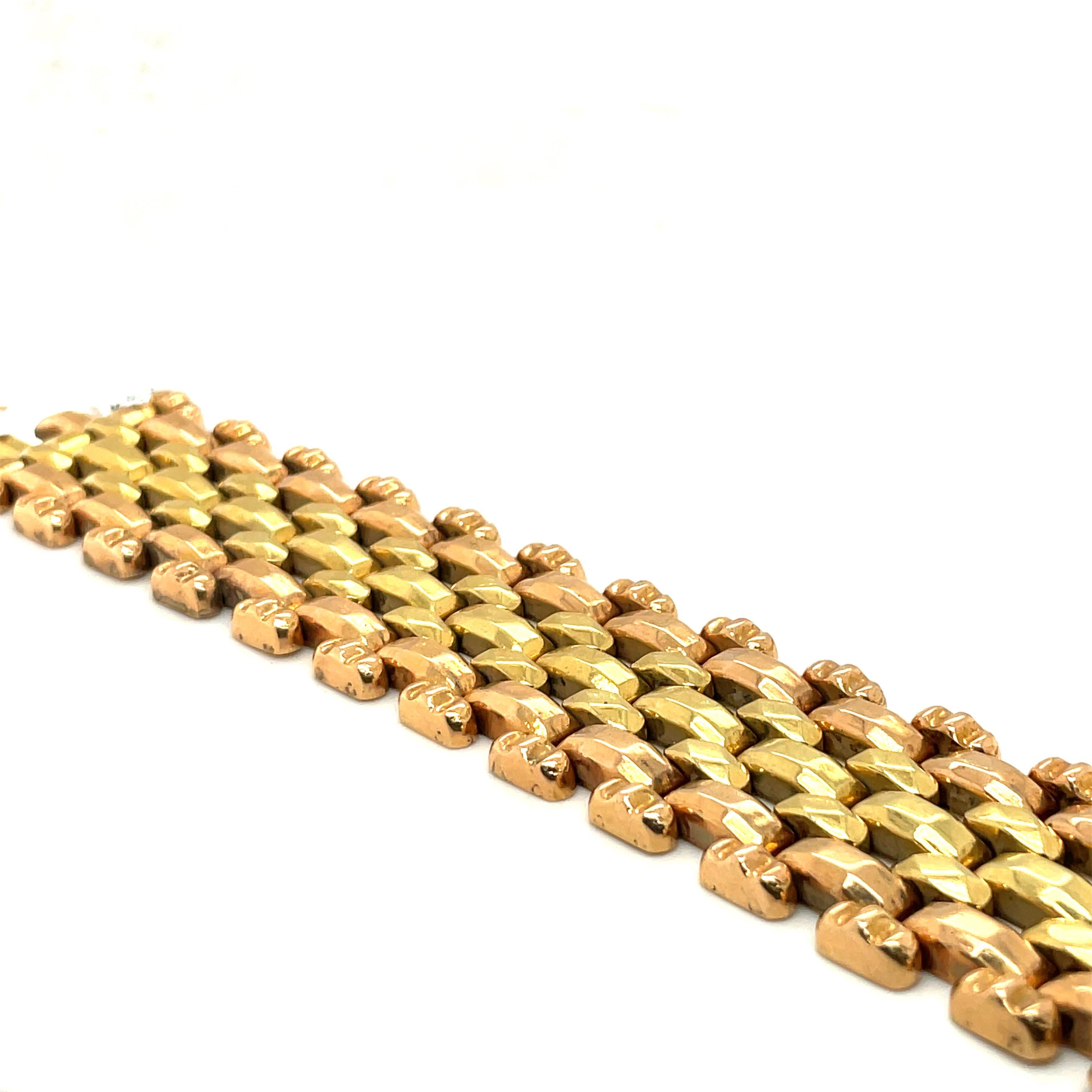 Breites Gliederarmband aus 18K Gelb- und Roségold

8