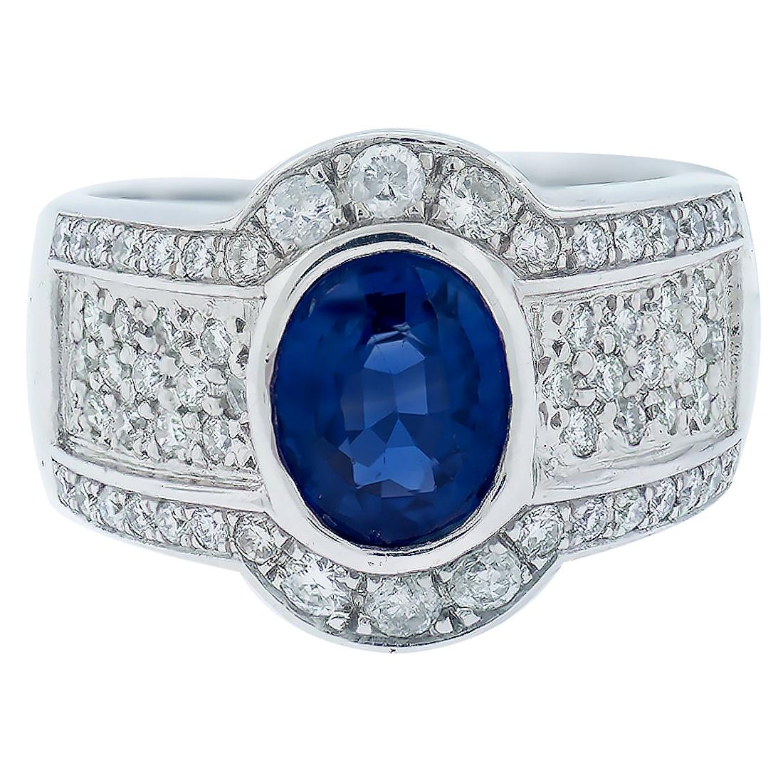 2.53 Sapphire Halo 1.50 Carat Diamond Ring For Sale