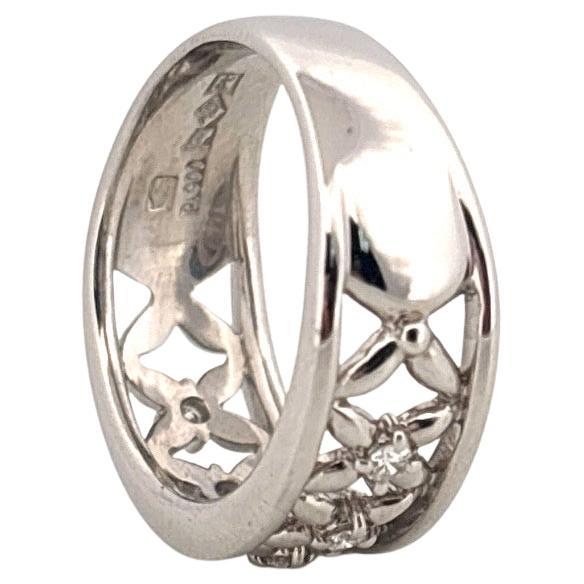 Large 5 anneau en X en platine avec diamant taille ronde 0.15ctw Bon état - En vente à Sewickley, PA