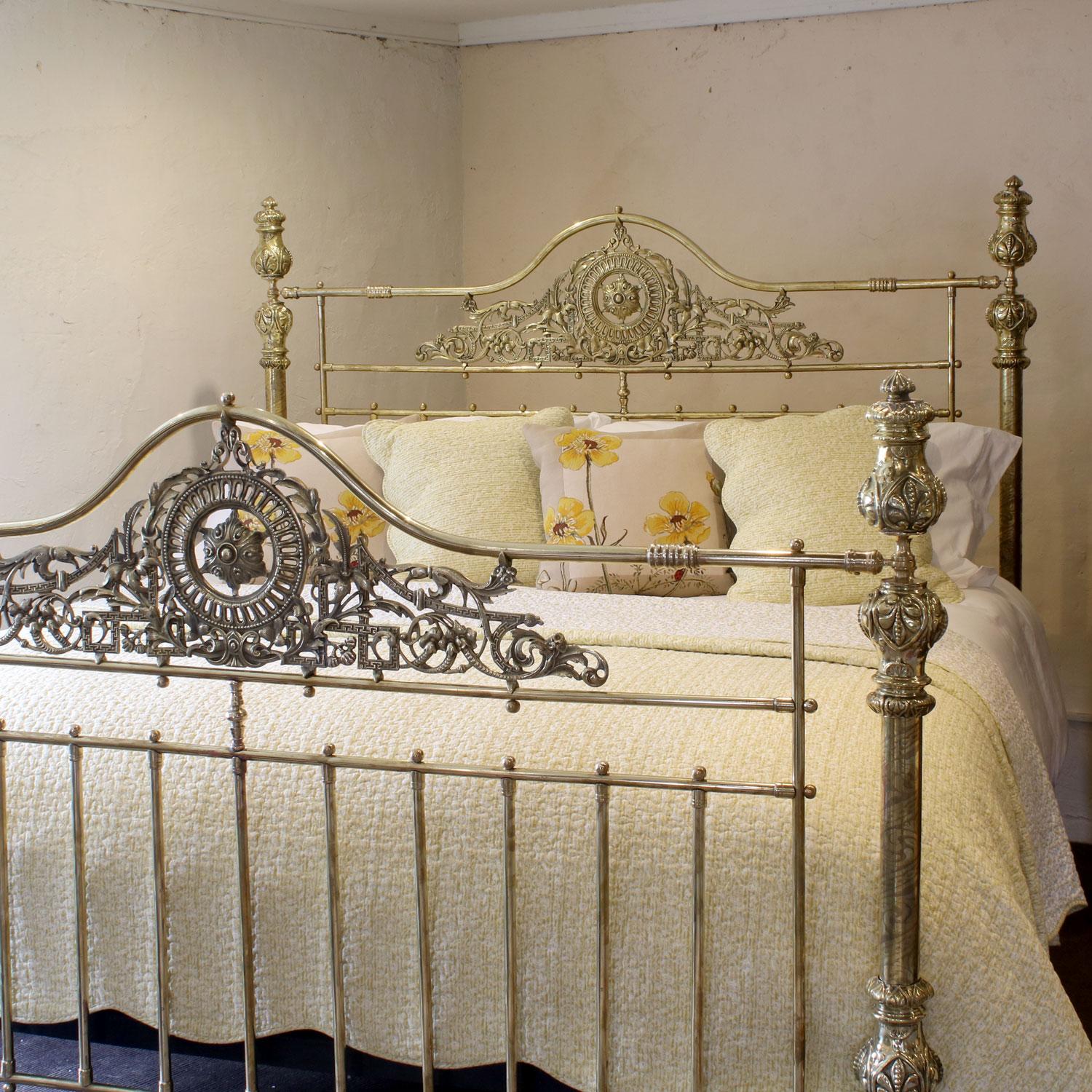 A superb all brass 6ft wide antique bed with serpentine brass top rails, decorative central brass castings, rare etched posts and ornate brass fittings.

Originally manufactured in Birmingham, circa 1880, this bed was made for export and was