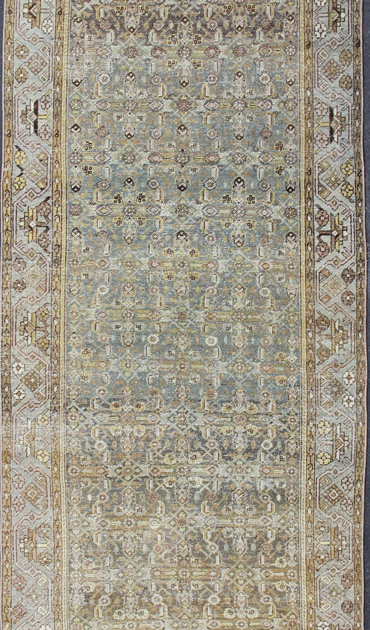 Rare Persian Malayer antique wide runner with all-over Herati design in dark gray background and variation of blue, yellow green, light gray, soft yellow, rug SUS-2007-38, country of origin / type: Iran / Malayer, circa 1920.

This antique Persian