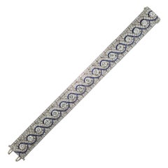 Wide Art Deco Platinum Diamond and Calibre Sapphire Bracelet