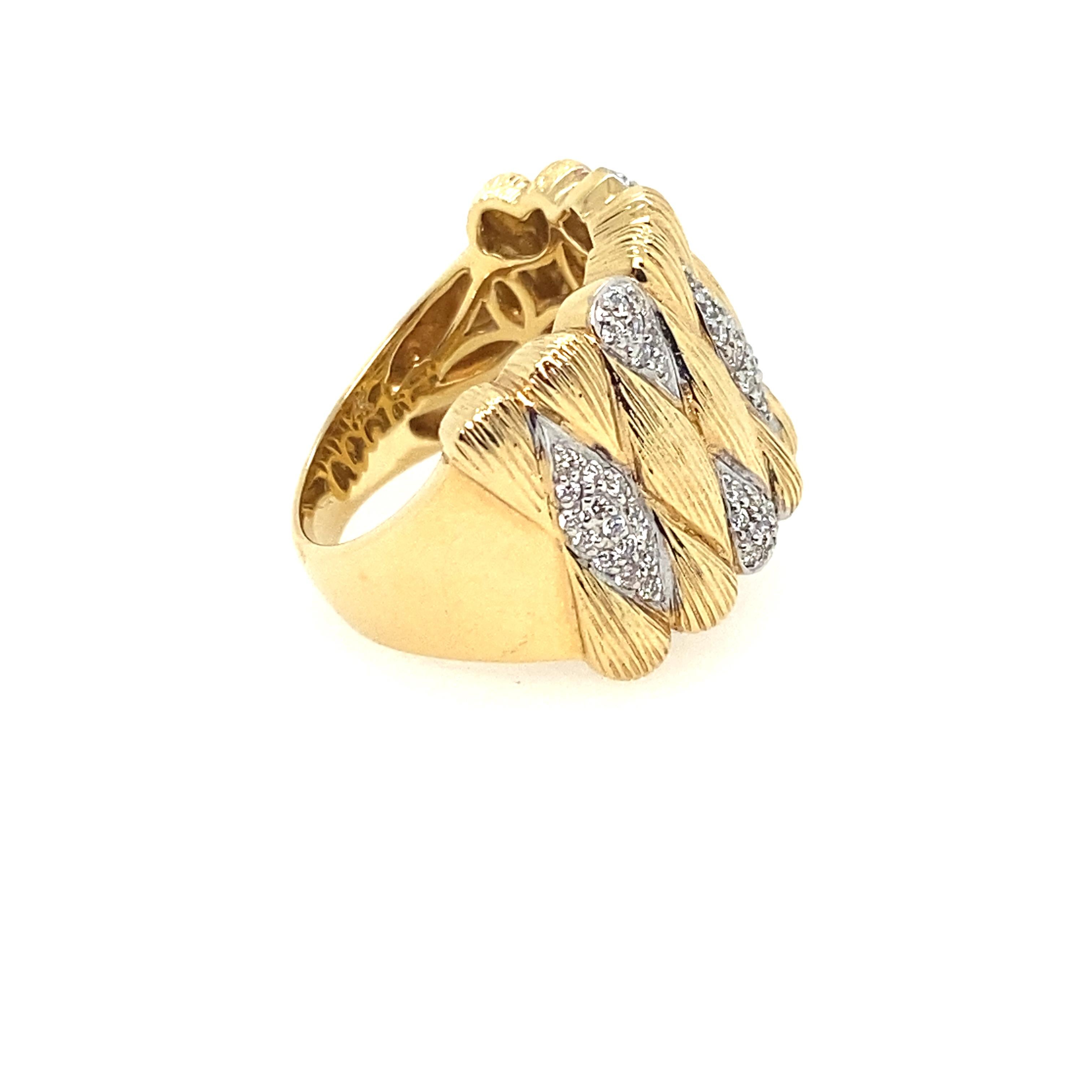 Wide Gold Band Ring with diamonds.  This chic wide band ring is a stunner!  With the beautiful 14kt yellow textured gold and quilted look with pave diamonds.  A style that will last forever.  It is size 7.5.  it can be sized down, or worn as a great