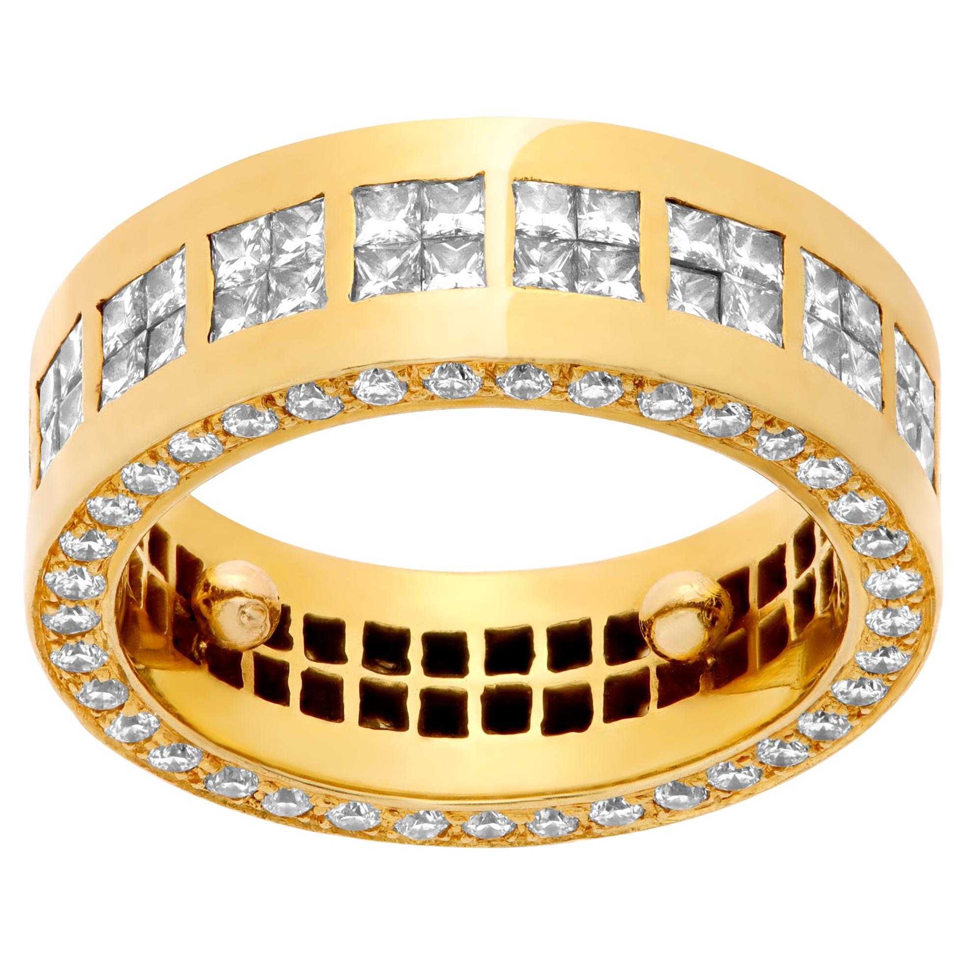 Wide band in 18k yellow gold with approximately 2.16 carats in diamonds